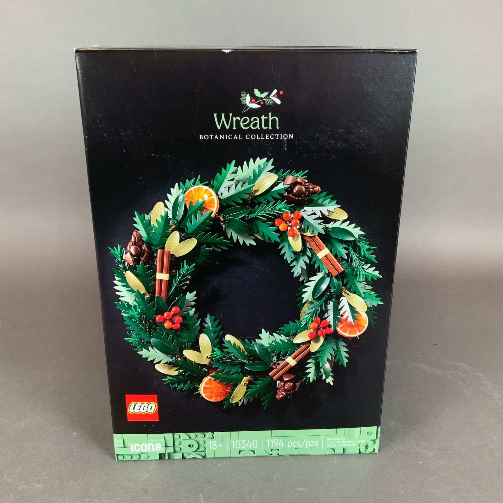LEGO Icons Botanical Collection Set, Wreath 10340: This is a factory-sealed LEGO Icons Botanical Collection building set, titled Wreath, set number 10340. The set consists of 1,194 plastic pieces and is rated for ages 18 and up. The model features a 2