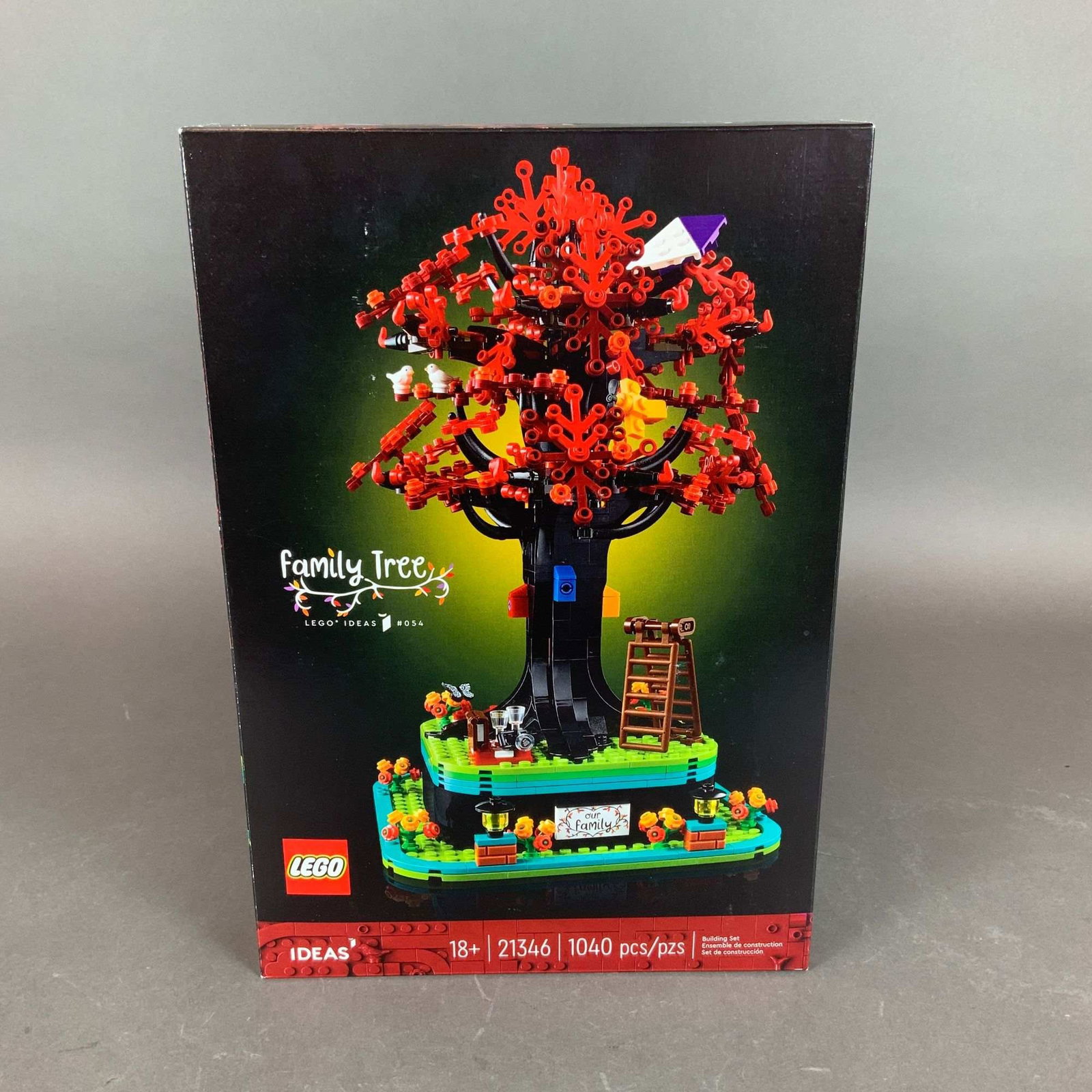 LEGO Ideas Set, Family Tree 21346: A LEGO Ideas construction set, model number 21346, titled Family Tree. This set is designated as number 054 in the LEGO Ideas series. The set features a buildable display model of a tree with red foli