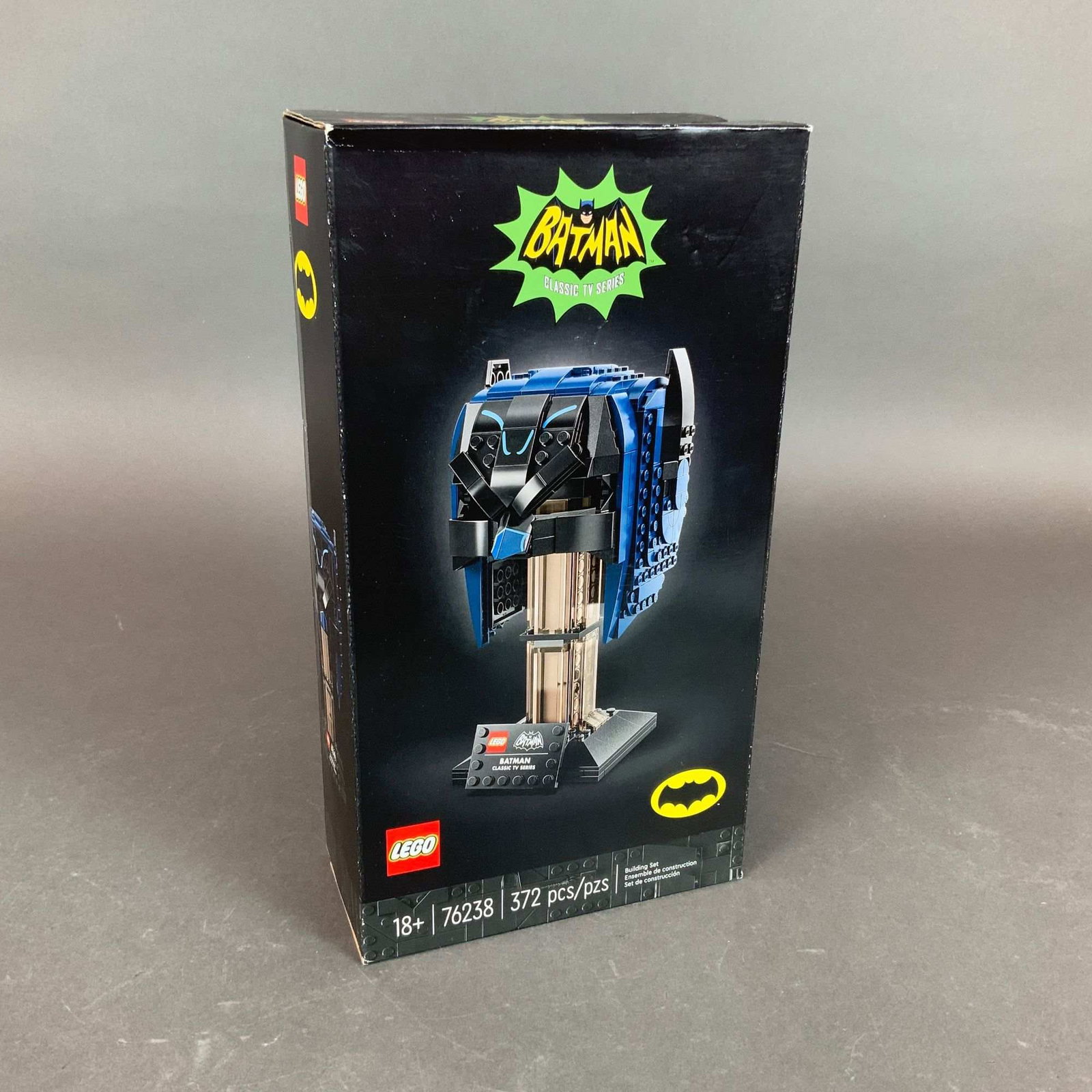 LEGO DC Batman Classic TV Series Cowl Building Set 76238: LEGO DC Super Heroes Classic TV Series Batman Cowl construction building set, model number 76238. This plastic set consists of 372 pieces and is designed for adult collectors as part of an 18+ age-rat