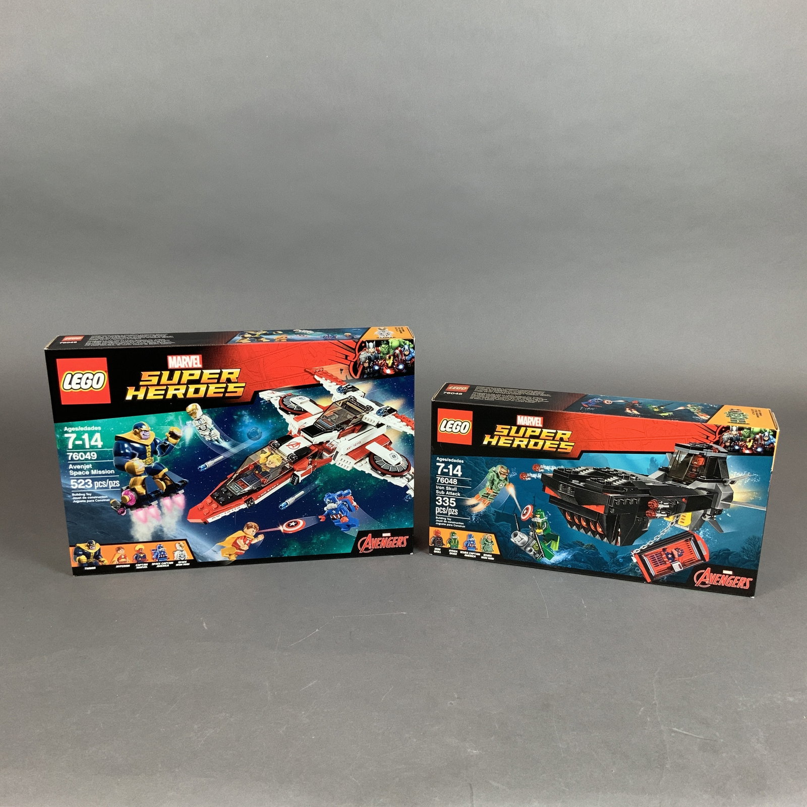 2pc LEGO Marvel Super Heroes Building Sets Nos. 76048 and 76049: This lot contains two LEGO building toys from the Marvel Super Heroes Avengers series. Both sets remain in their original retail packaging. Included is LEGO set No. 76048, Iron Skull Sub Attack. This 