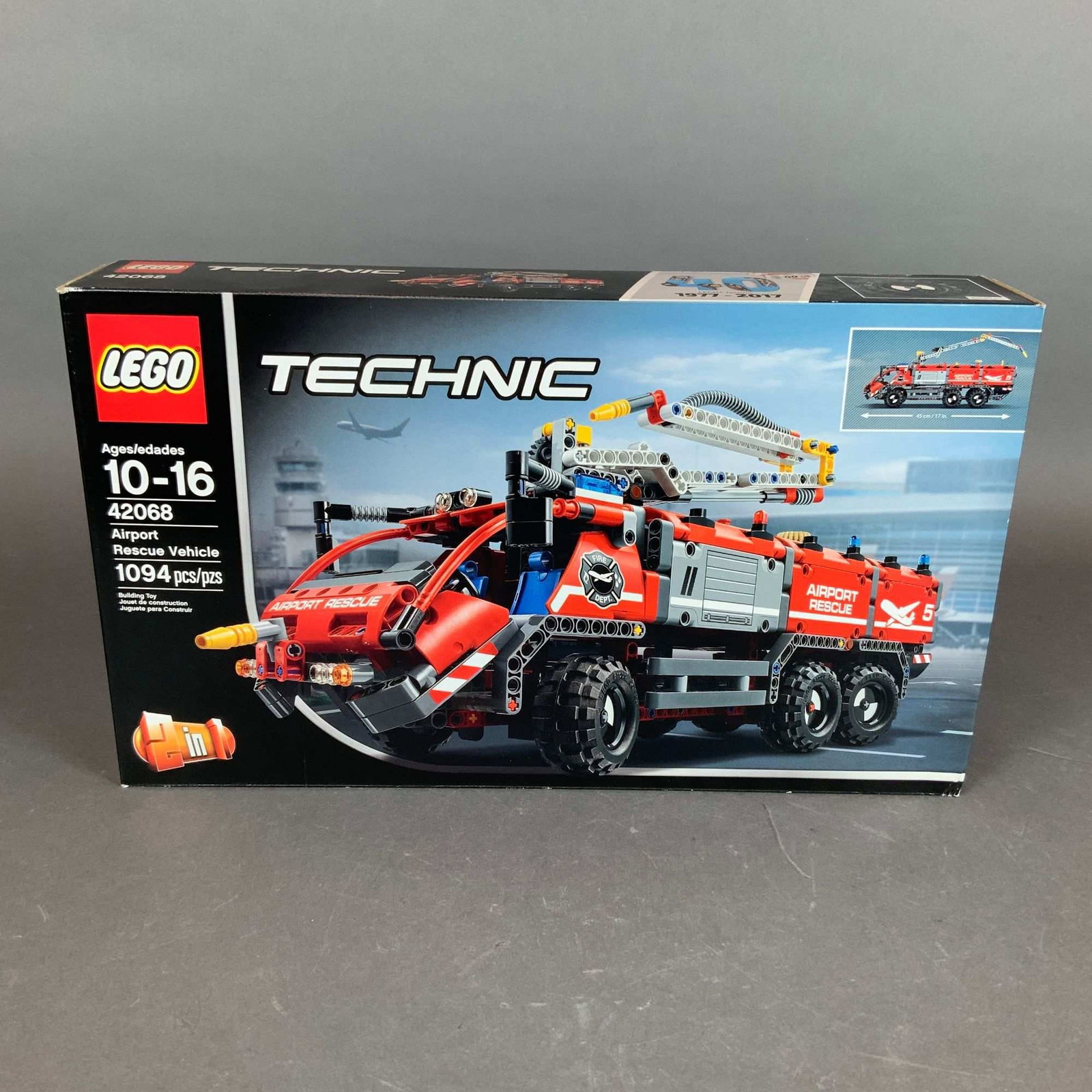 LEGO Technic Airport Rescue Vehicle Building Set 42068: This LEGO Technic building set, model number 42068, is titled Airport Rescue Vehicle and consists of 1,094 plastic pieces. Released in 2017, this set is a 2-in-1 model designed for ages 10 to 16, allo