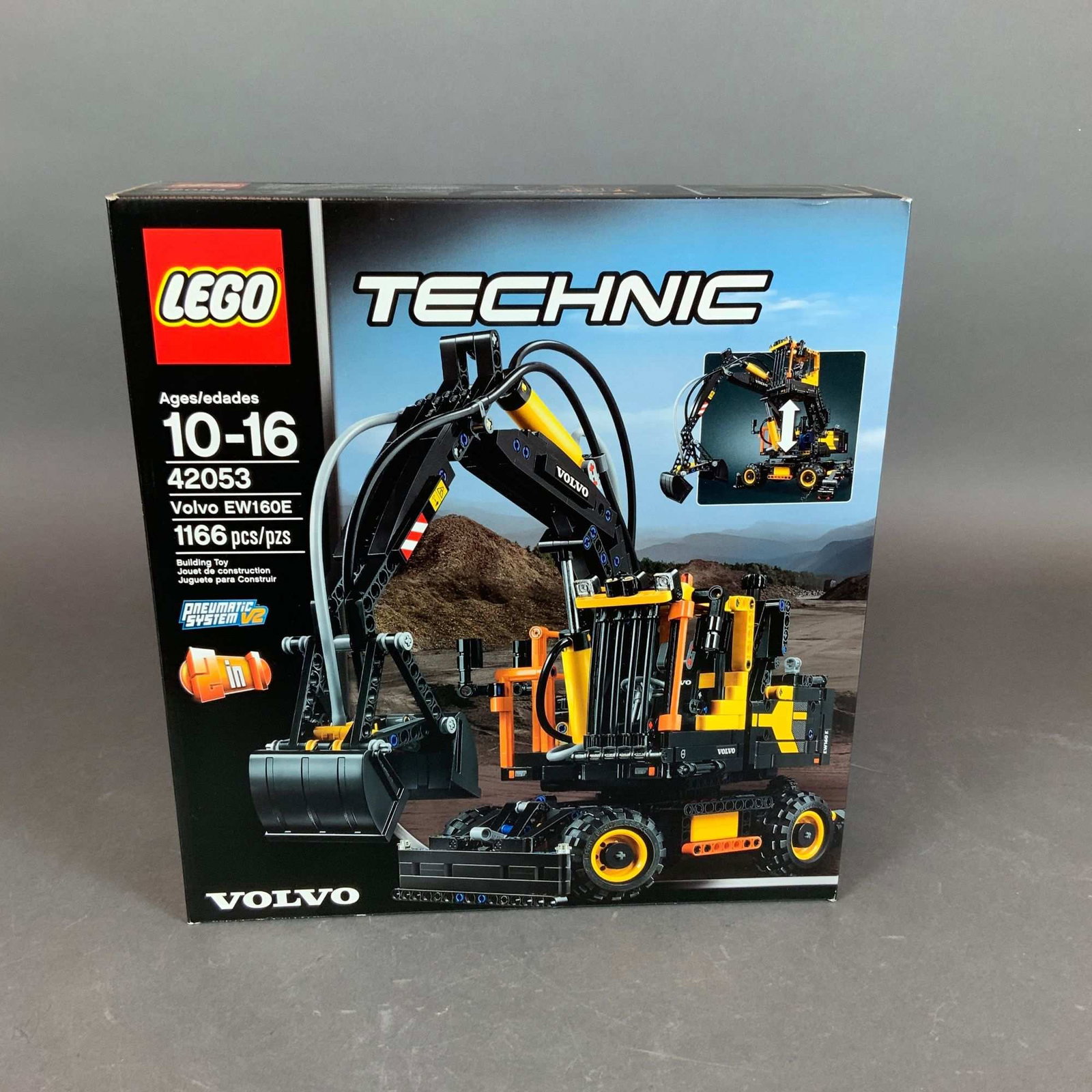 LEGO Technic Volvo EW160E Wheeled Excavator Building Set 42053: This is a factory-sealed LEGO Technic building construction set, model number 42053, featuring the Volvo EW160E wheeled excavator. The set consists of 1,166 plastic pieces and is designed for the 10-1