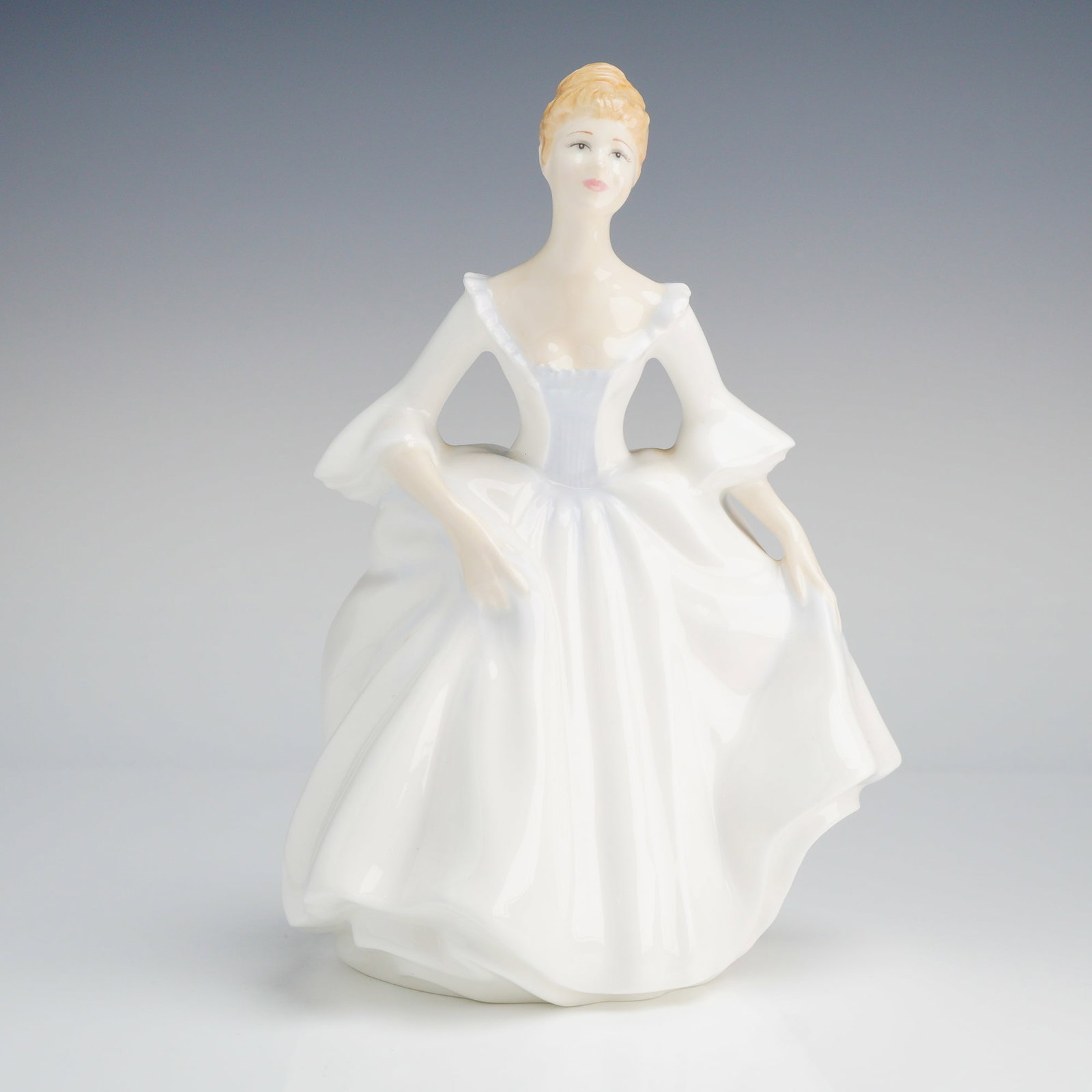 Royal Doulton Colorway Figurine, Alyssa HN 4132: A Royal Doulton figurine, depicting a woman in a white dress, marked as modelled by Peggy Davies and copyrighted 1998 as an exclusive colorway for U.S. stores. Dimensions: 5.50"L x 4.75"W x 8.00"H Wei