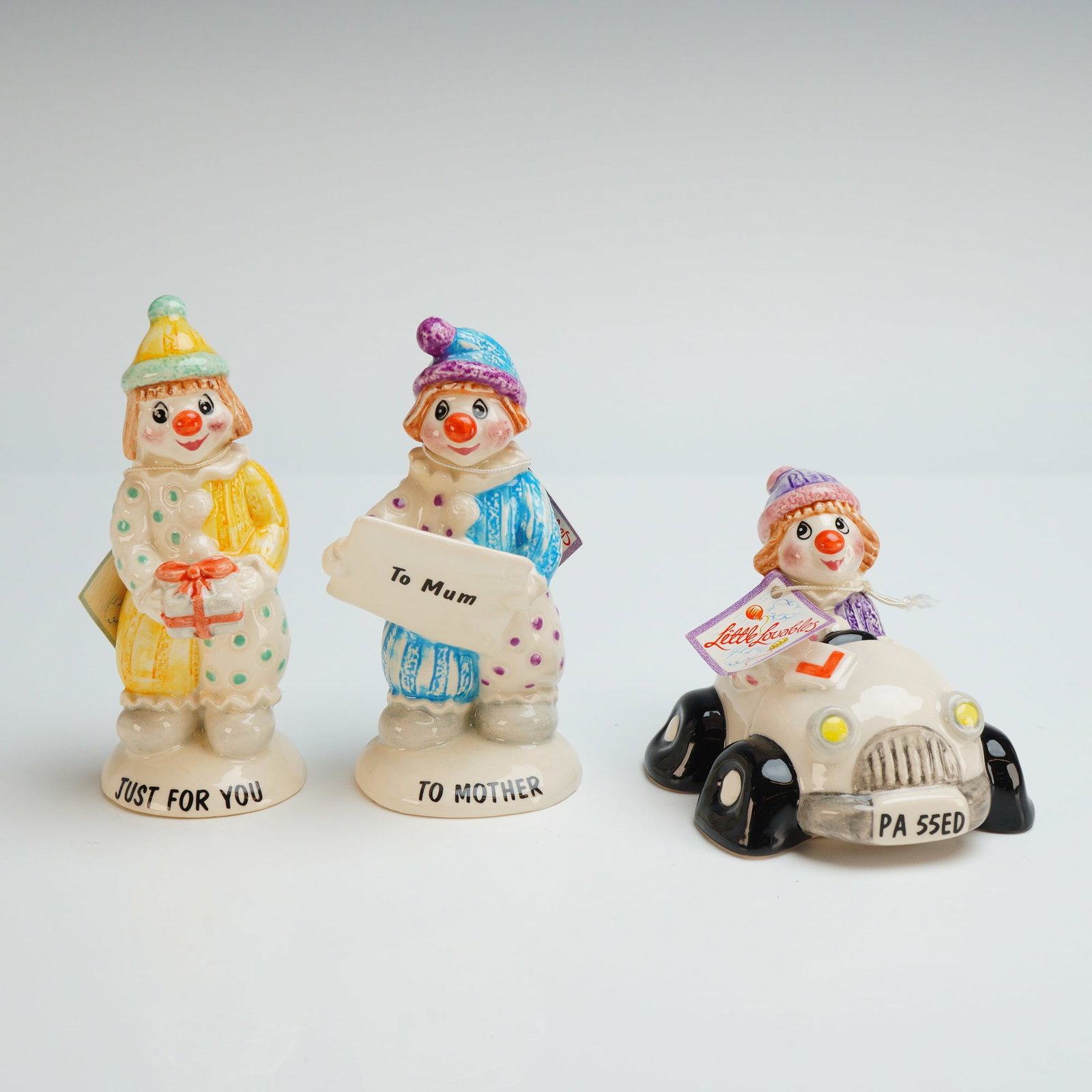 3pc Beswick Little Lovables Figurines, Just for You, To Mother, & Passed: Consisting of the Just for You LL11 model, featuring a standing clown in yellow and white patterned attire holding a gift; the To Mother LL5 model, depicting a standing clown in blue and white pattern