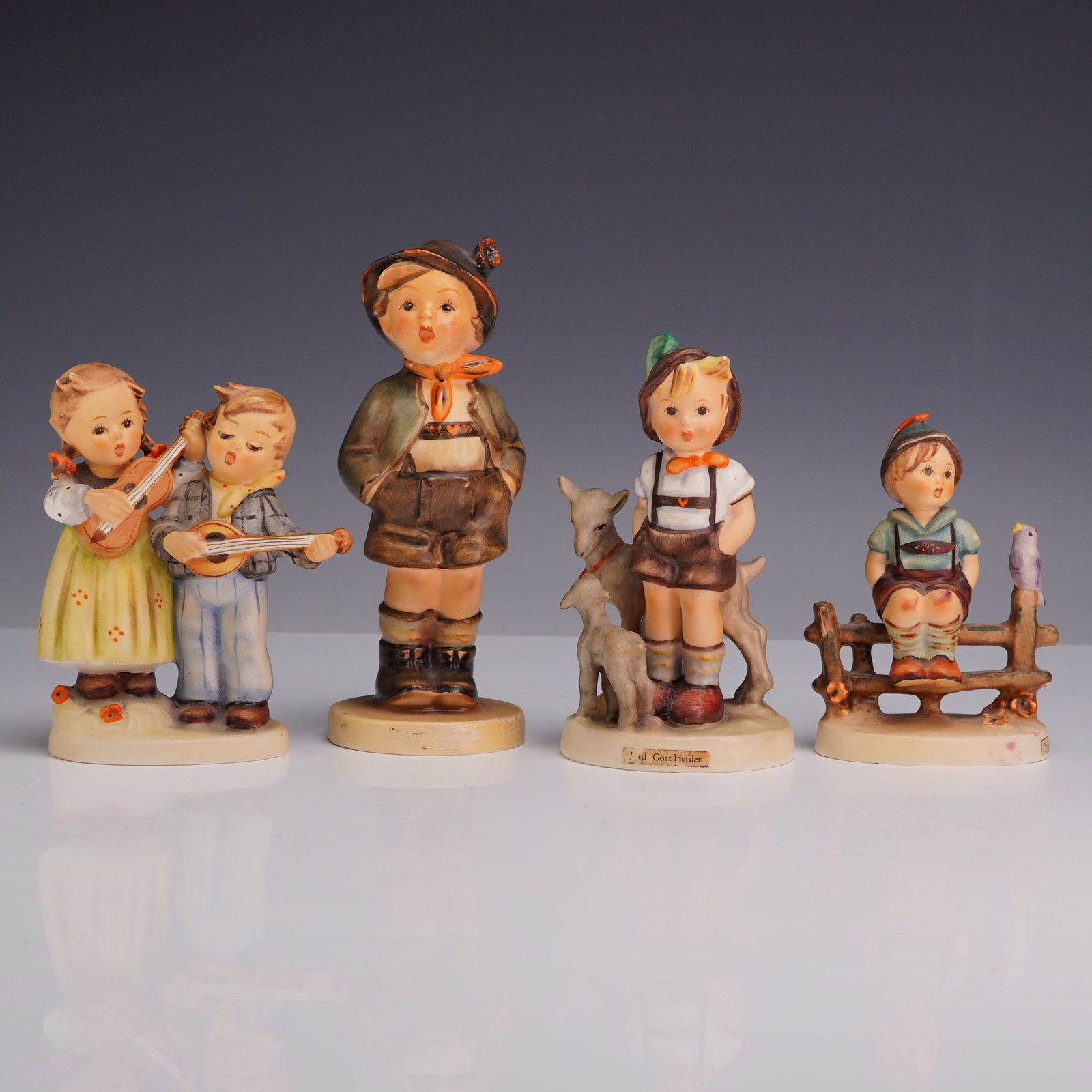 4pc Grouping of Goebel M.I. Hummel Porcelain Figurines (1 of 3)