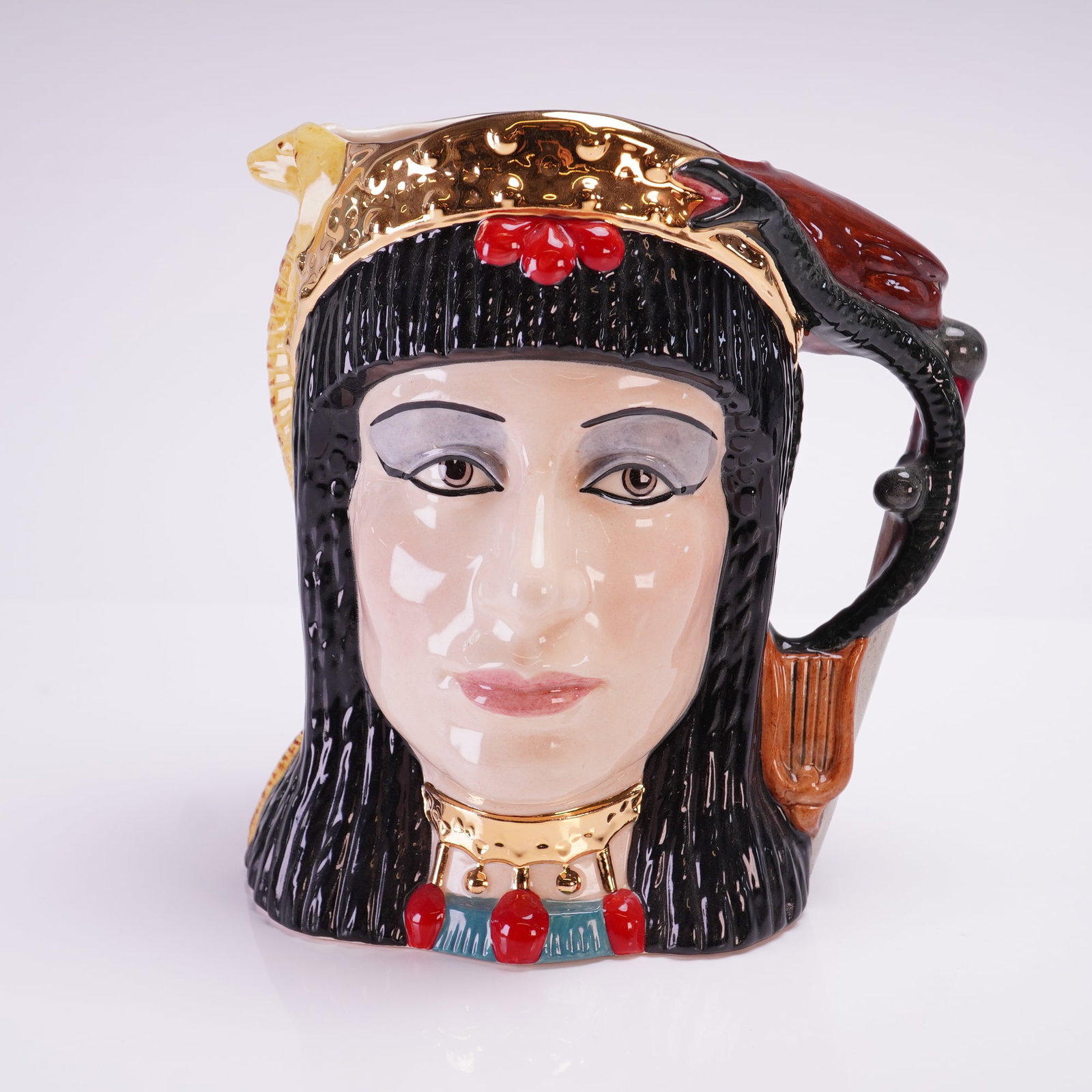 Royal Doulton Antony & Cleopatra Character Jug D6728: A Royal Doulton ceramic character jug from The Star Crossed Lovers Collection, titled Antony & Cleopatra D6728. This double-sided piece was modeled by Michael Abberley and is dated 1984. One side feat