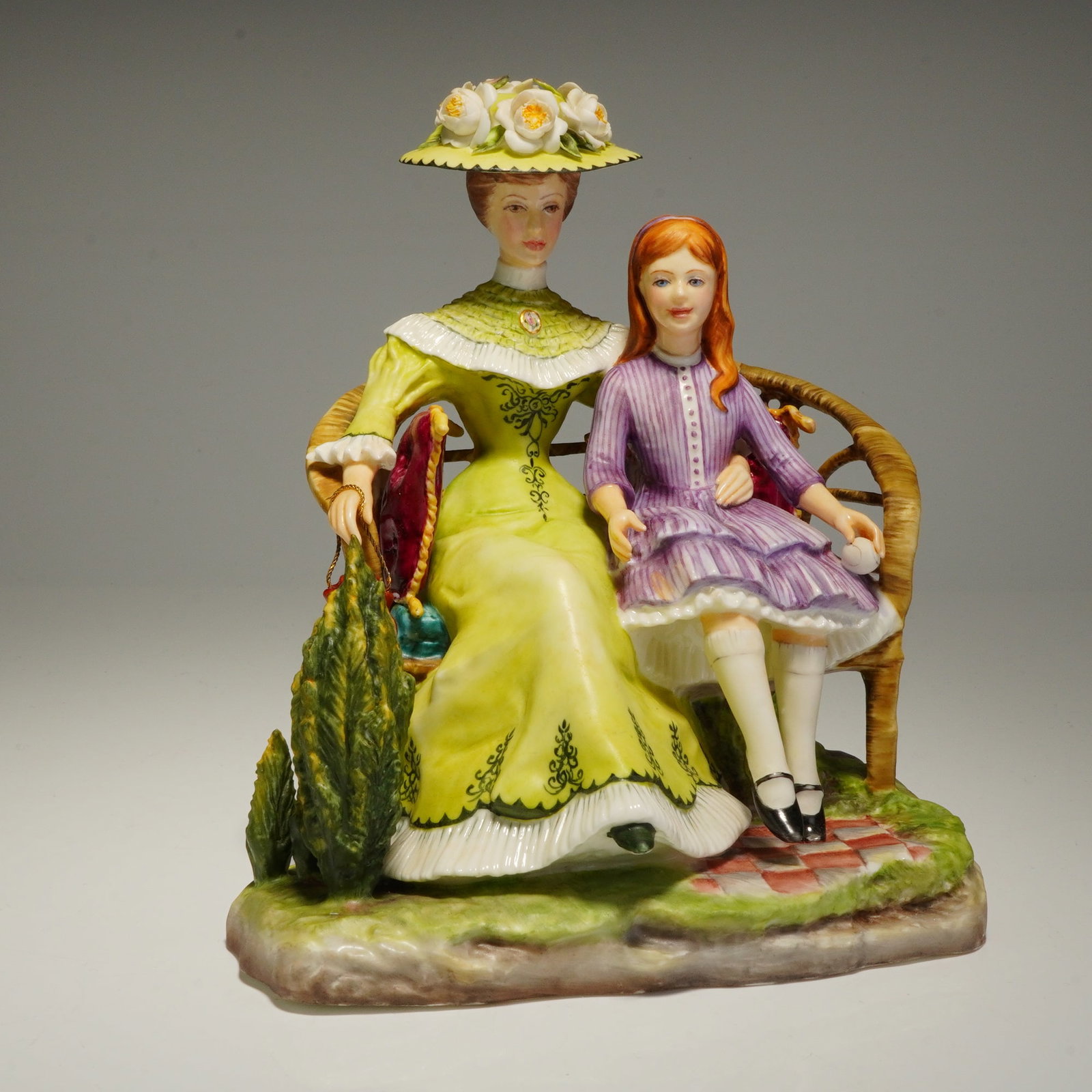 Royal Worcester Victorian Series Charlotte and Jane Figurine: A Royal Worcester bone china figurine from the Victorian Series titled Charlotte and Jane. This piece was modeled by Ronald Van Ruyckevelt and is dated 1968. The hand-painted group depicts two female 