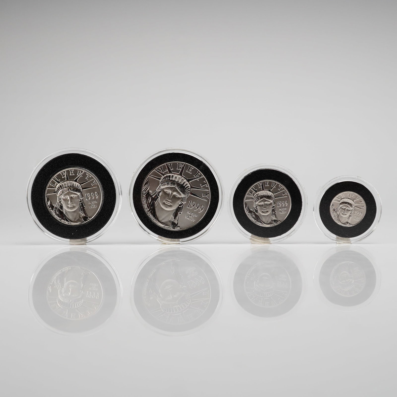 1999 American Platinum Eagle 4-Coin Set 1.85 oz total: 1999 American Platinum Eagle 4-Coin Set containing four denominations struck in 0.9995 fine platinum: the $10 (1/10 oz), $25 (1/4 oz), $50 (1/2 oz), and $100 (1 oz). The obverse of each coin features 