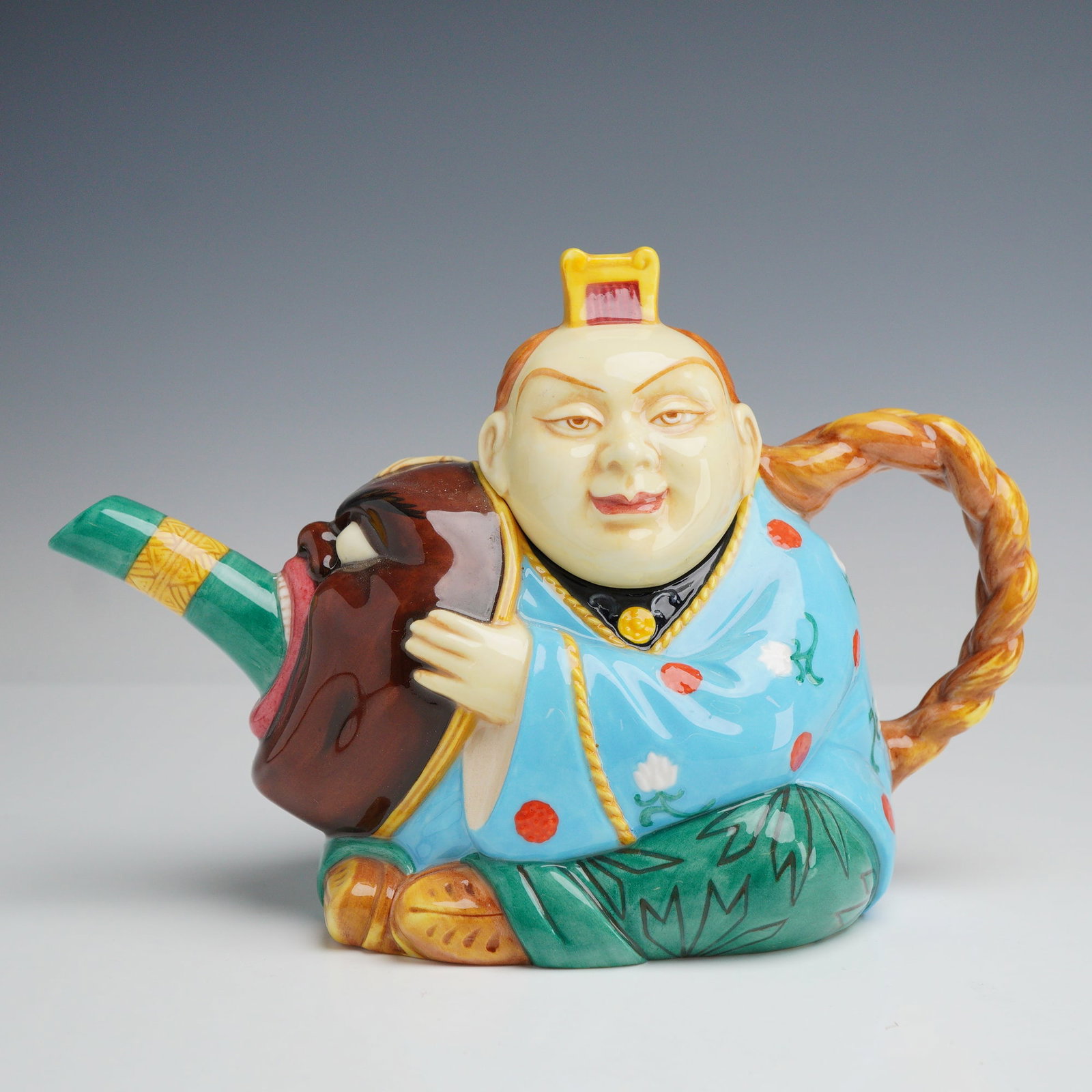 Minton Archive Collection Chinaman Figural Teapot Limited Edition: This figural teapot is part of the Minton Archive Collection, produced in England in 1997 as a limited edition reproduction of a classic 19th-century majolica model. The piece is constructed of fine c