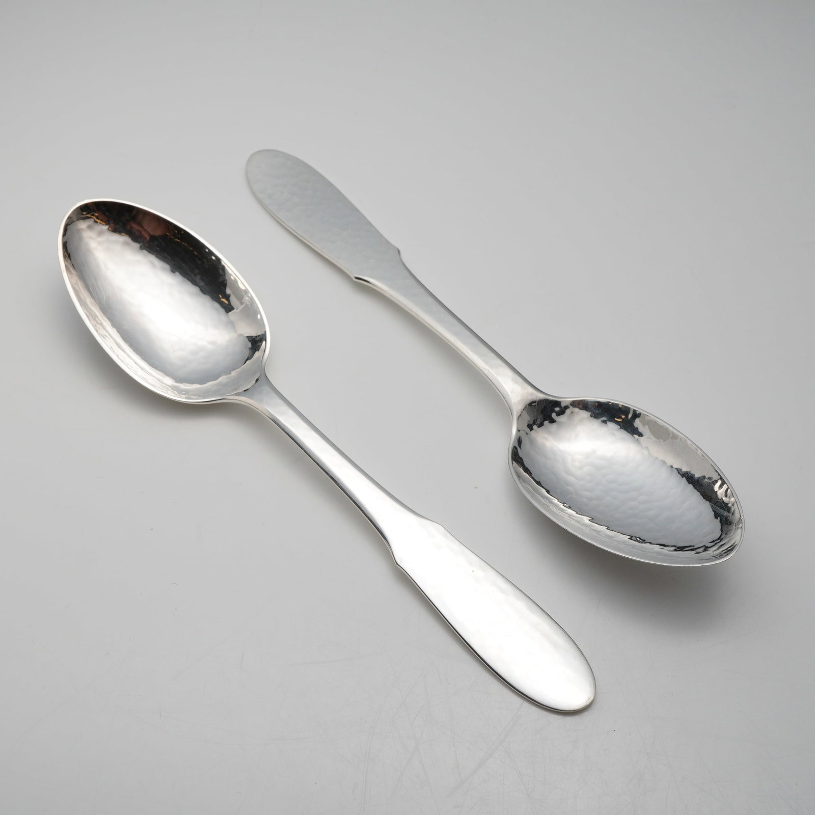 A Pair of Georg Jensen Denmark EPNS Mermaid Pattern Hammered Silverplate Oval Soup Spoons (1 of 3)