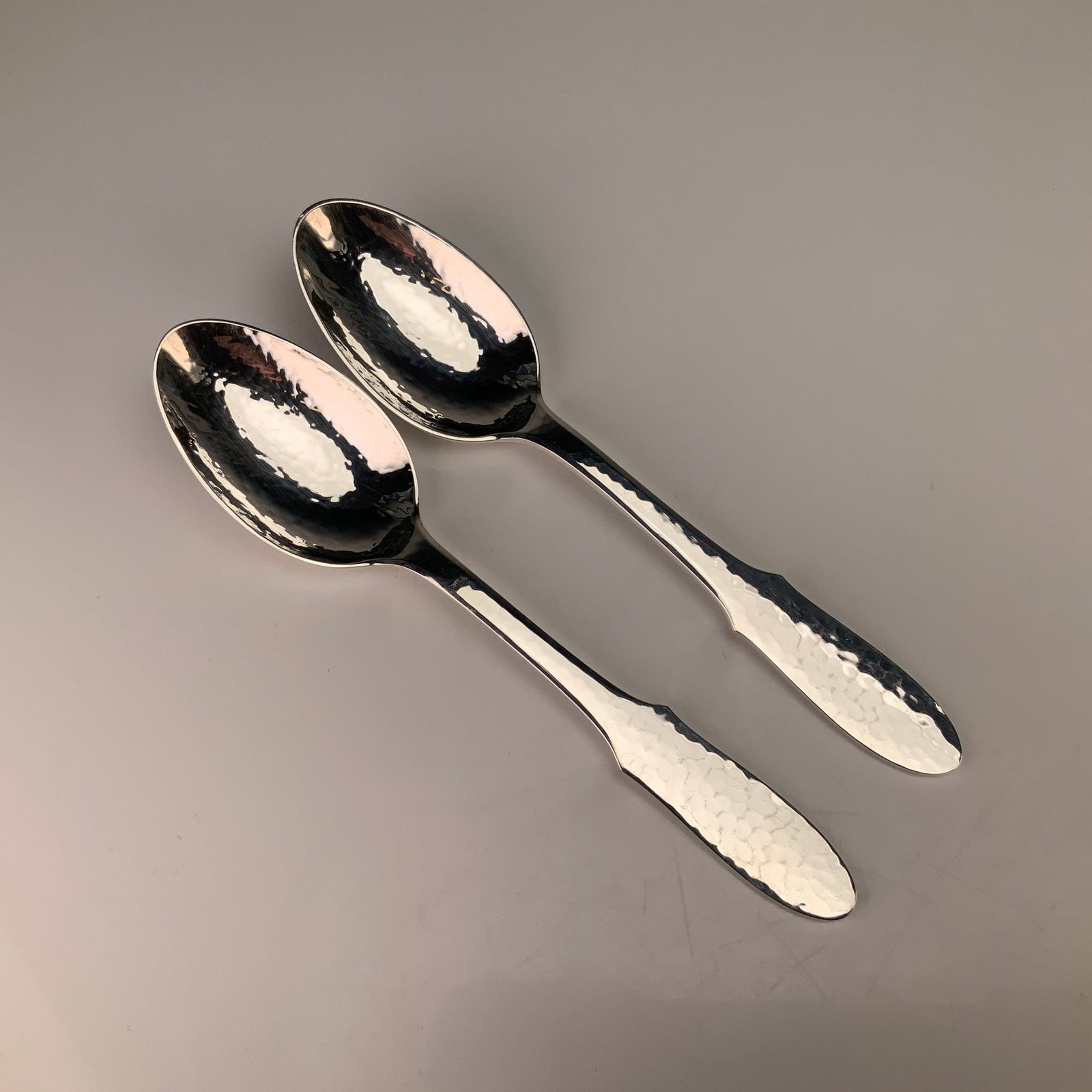 A Pair of Georg Jensen Mermaid Pattern Hammered Silverplate Teaspoons (1 of 3)