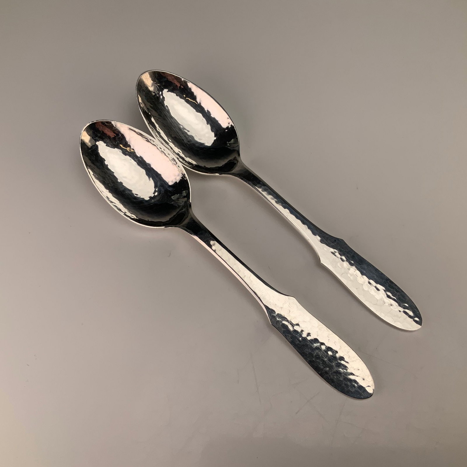 A Pair of Georg Jensen Mermaid Pattern Hammered Silverplate Teaspoons (1 of 3)