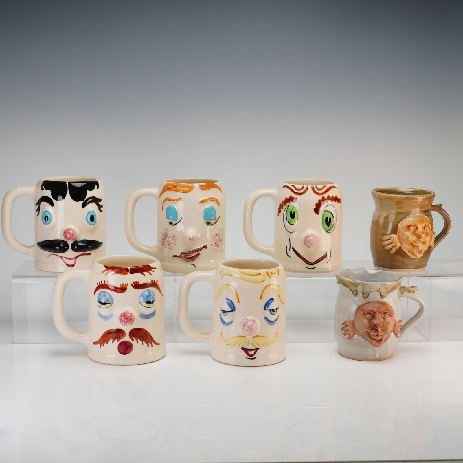 Collection of 7 Mugs Including Pfaltzgraff Muggsy Series and Goldenware Pottery (1 of 3)