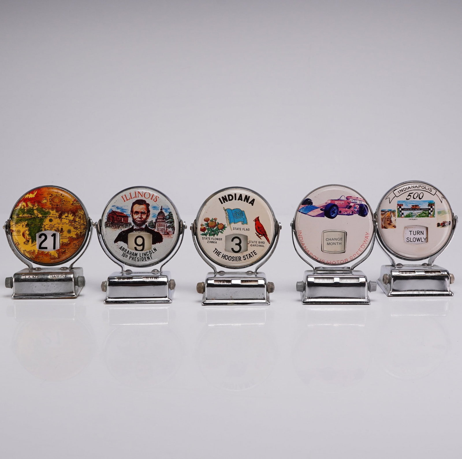 A Collection of 5 Roll Top Perpetual Mechanical Flip Desk Calendars (1 of 4)