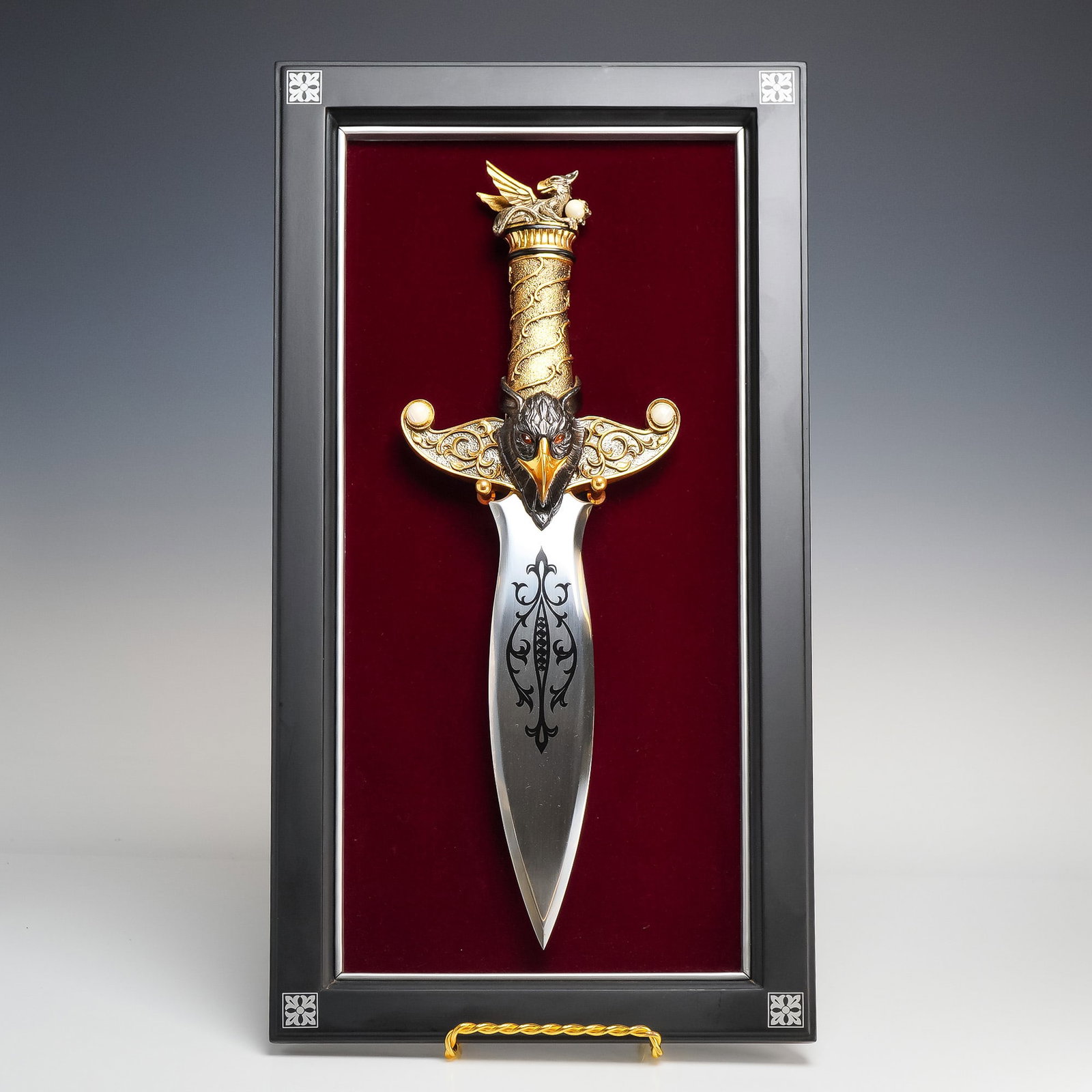 China, Franklin Mint The Sentinel of Wisdom Decorative Fantasy Dagger, Late 20th Century: This is a contemporary decorative fantasy dagger titled The Sentinel of Wisdom, designed by artist Greg Hildebrandt for The Franklin Mint. The piece features a leaf-shaped, double-edged stainless stee
