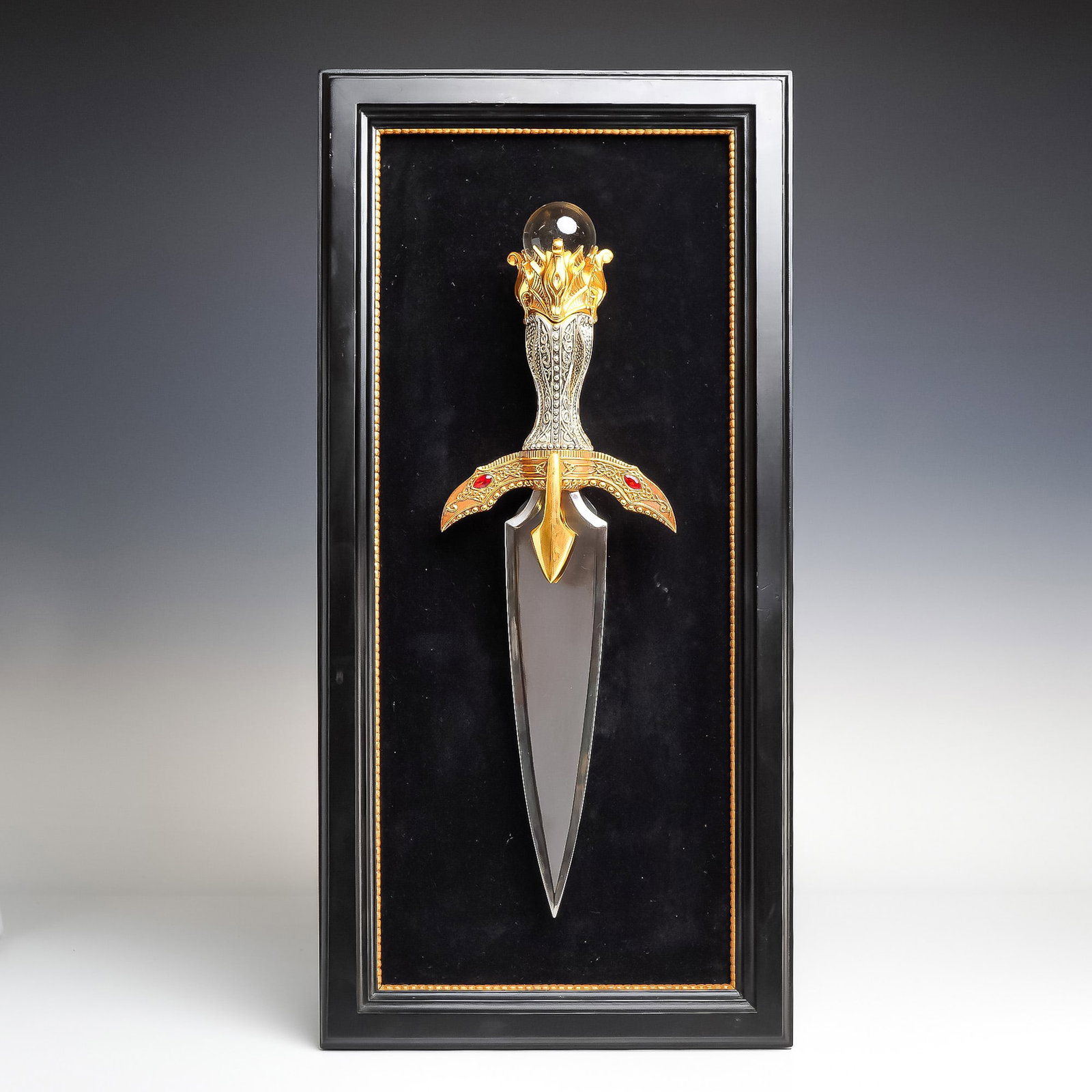 Chinese Franklin Mint King Arthur's Decorative Dagger, Contemporary: This contemporary decorative fantasy piece is a Franklin Mint King Arthur's Dagger and display, presented in a black shadowbox frame with a velvet-covered background. The dagger features a translucent
