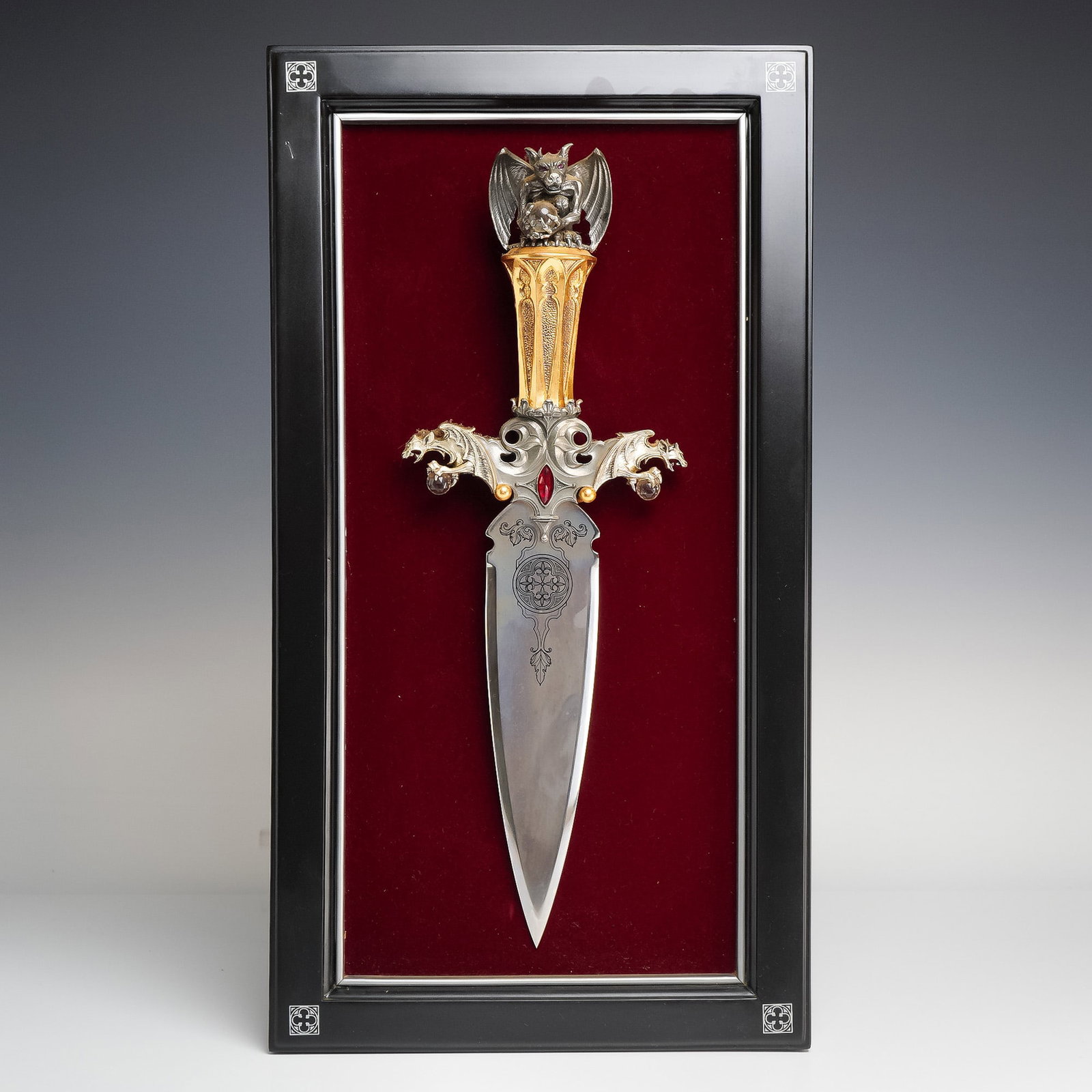 Contemporary Fantasy, Guardian of the Fortress Gargoyle Dagger and Display by Franklin Mint, Late: A contemporary fantasy-themed decorative piece titled The Guardian of the Fortress, designed by renowned artist Greg Hildebrandt for the Franklin Mint. This highly ornamental dagger features a cast si