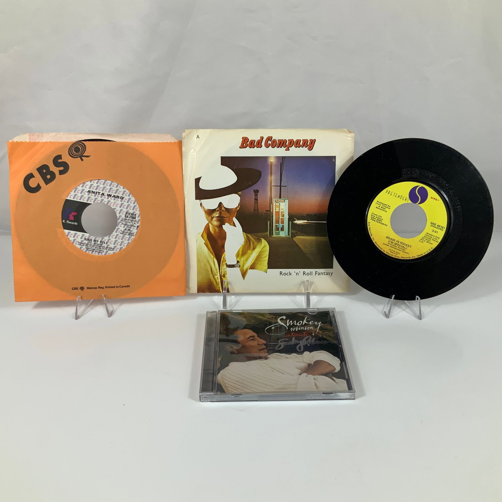 4pc Vintage 45 RPM Vinyl Records and an Autographed Smokey Robinson Compact Disc (1 of 3)