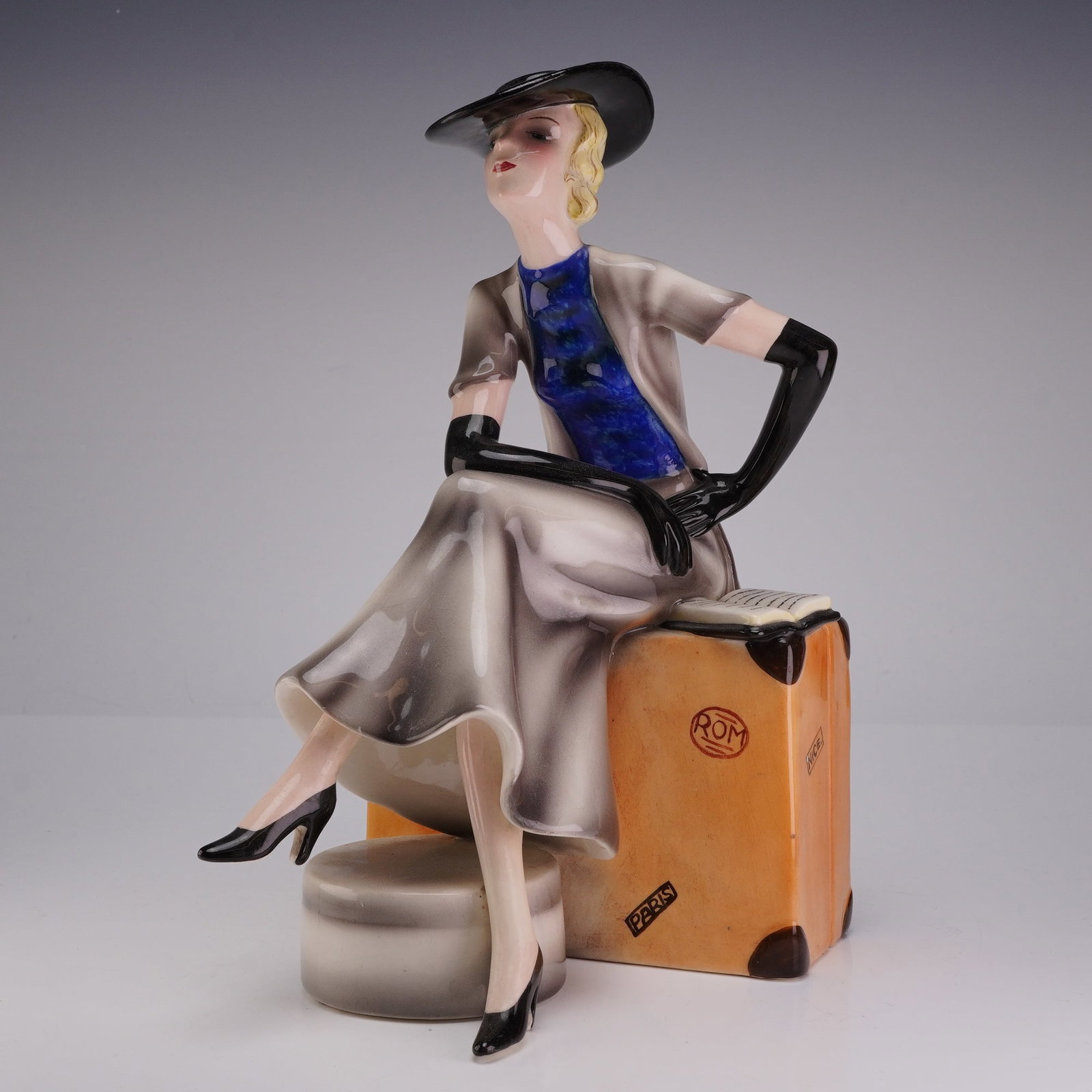 Goldscheider Austria Ceramic Figurine by Stefan Dakon, Seated Traveler Model 6959 (1 of 4)