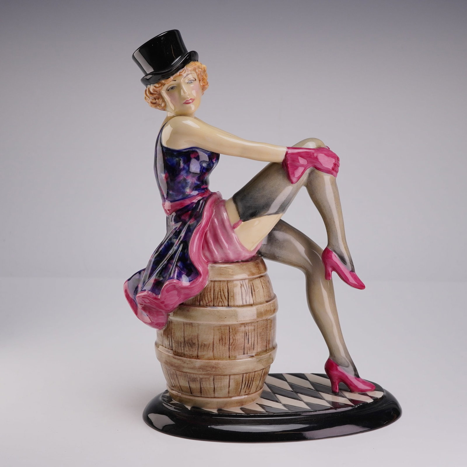 Kevin Francis Marlene Dietrich Limited Edition Porcelain Figurine: A hand-painted porcelain figurine produced by Peggy Davies Ceramics for Kevin Francis, depicting the actress Marlene Dietrich. The figure was modeled by Andy Moss and portrays Dietrich in her iconic r