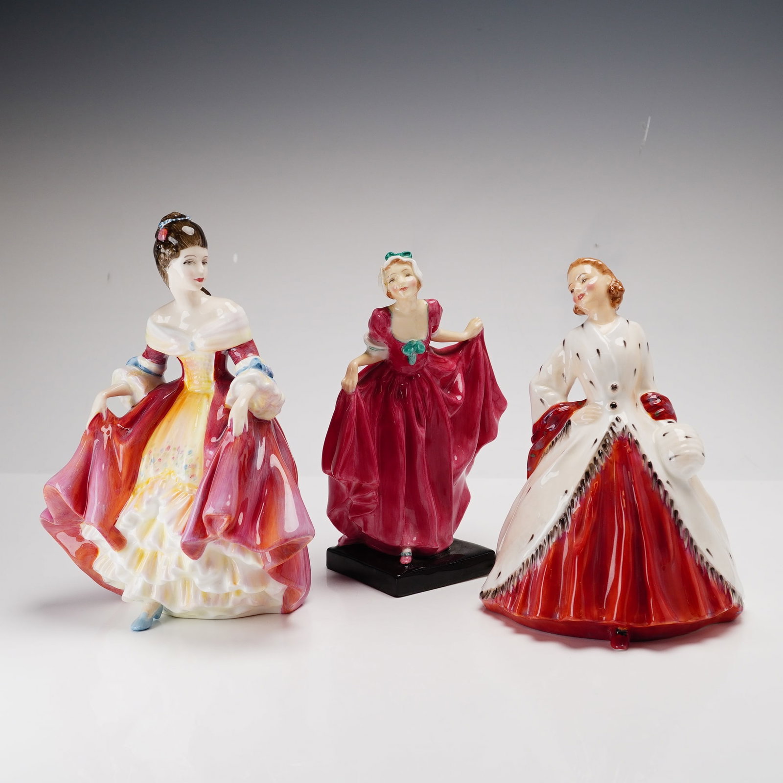 Three Royal Doulton Figurines- Southern Belle HN2229, Delight 1772 and The Ermine Coat 1981 (1 of 3)