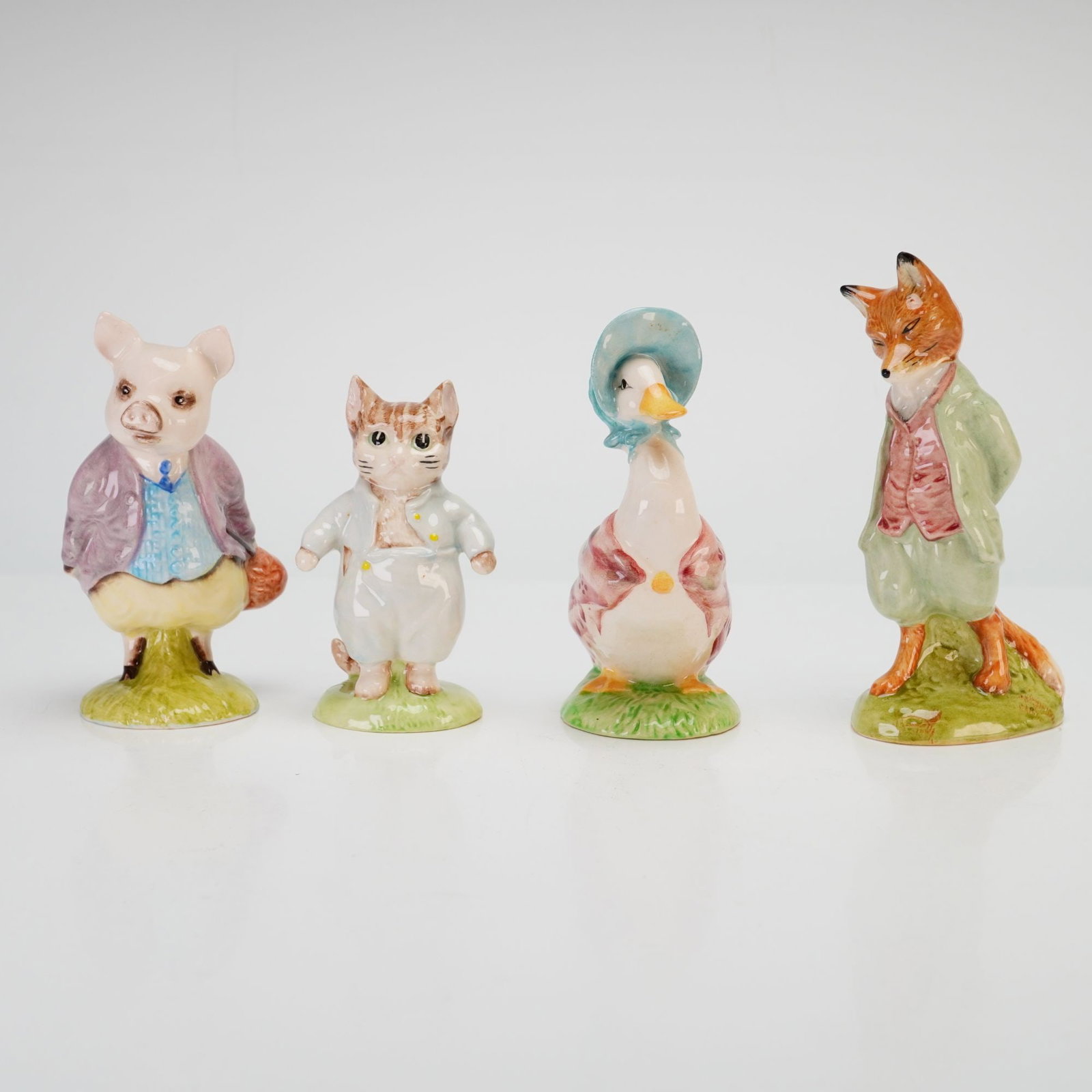Set of Four Beswick and Royal Albert Beatrix Potter Ceramic Figurines (1 of 3)