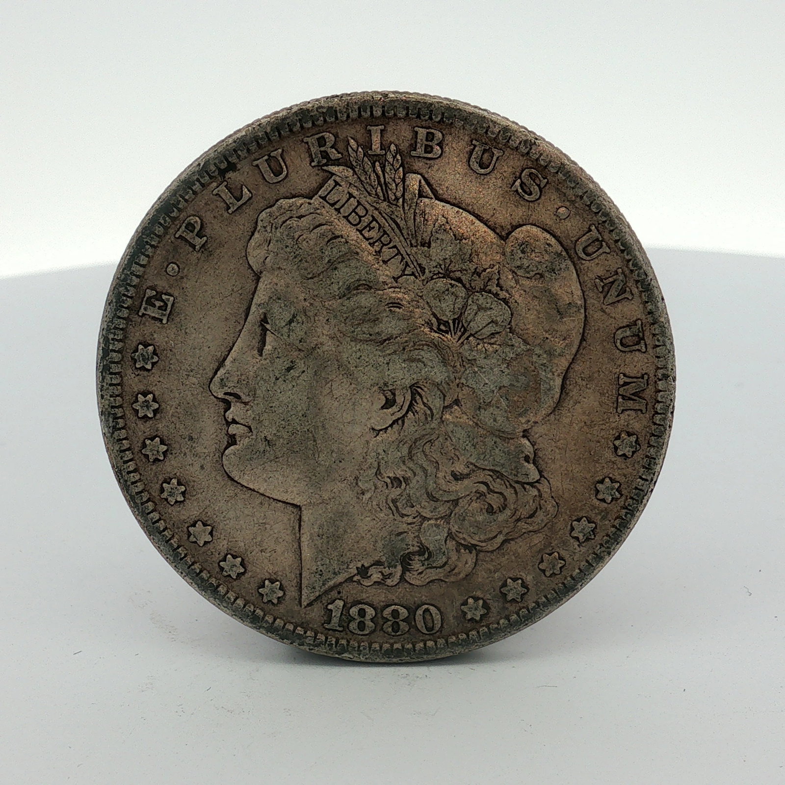 1880 US One Dollar Morgan Silver Dollar, Circulated (1 of 2)