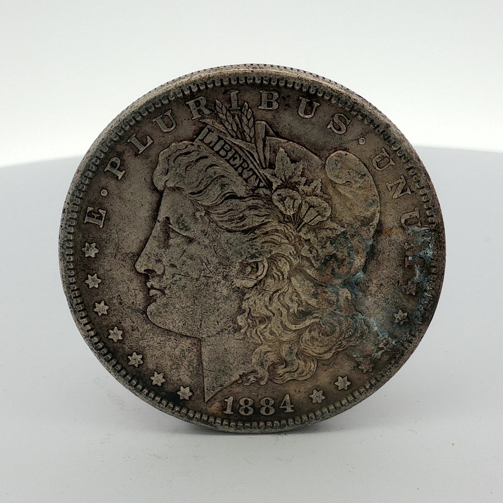 1884 US One Dollar Morgan Silver Dollar, Circulated (1 of 2)
