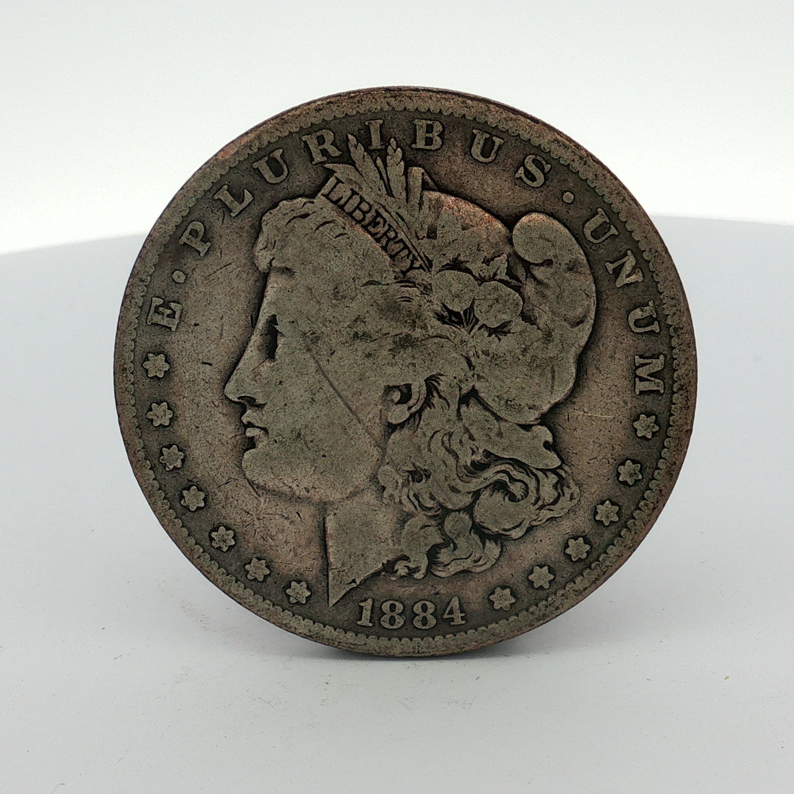 1884 US One Dollar Morgan Silver Dollar, Circulated (1 of 2)