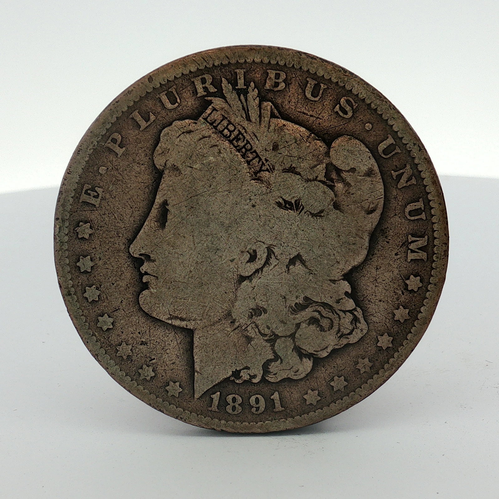 1891-O US Morgan Silver Dollar (1 of 2)