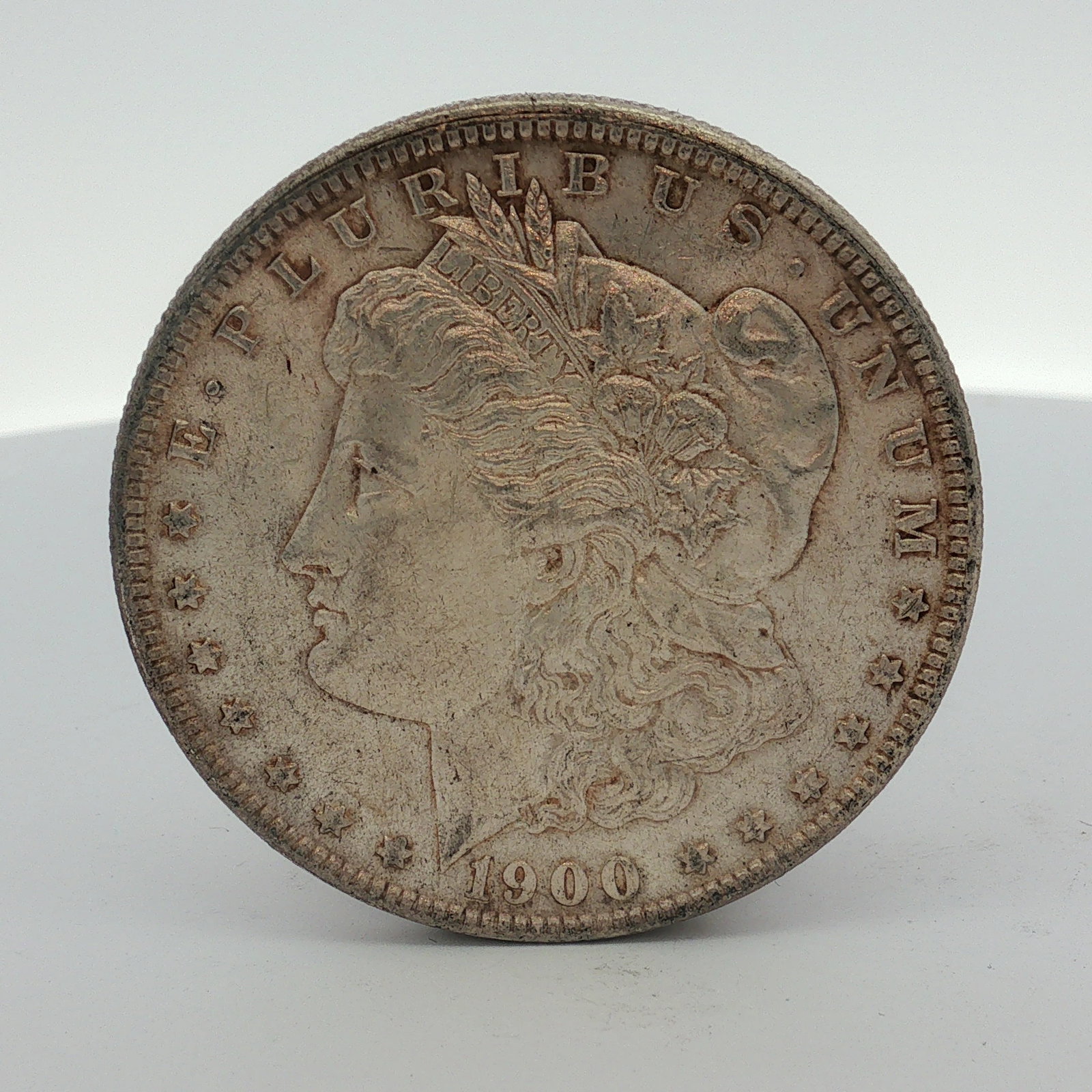 1900-O US Morgan Silver Dollar (1 of 2)