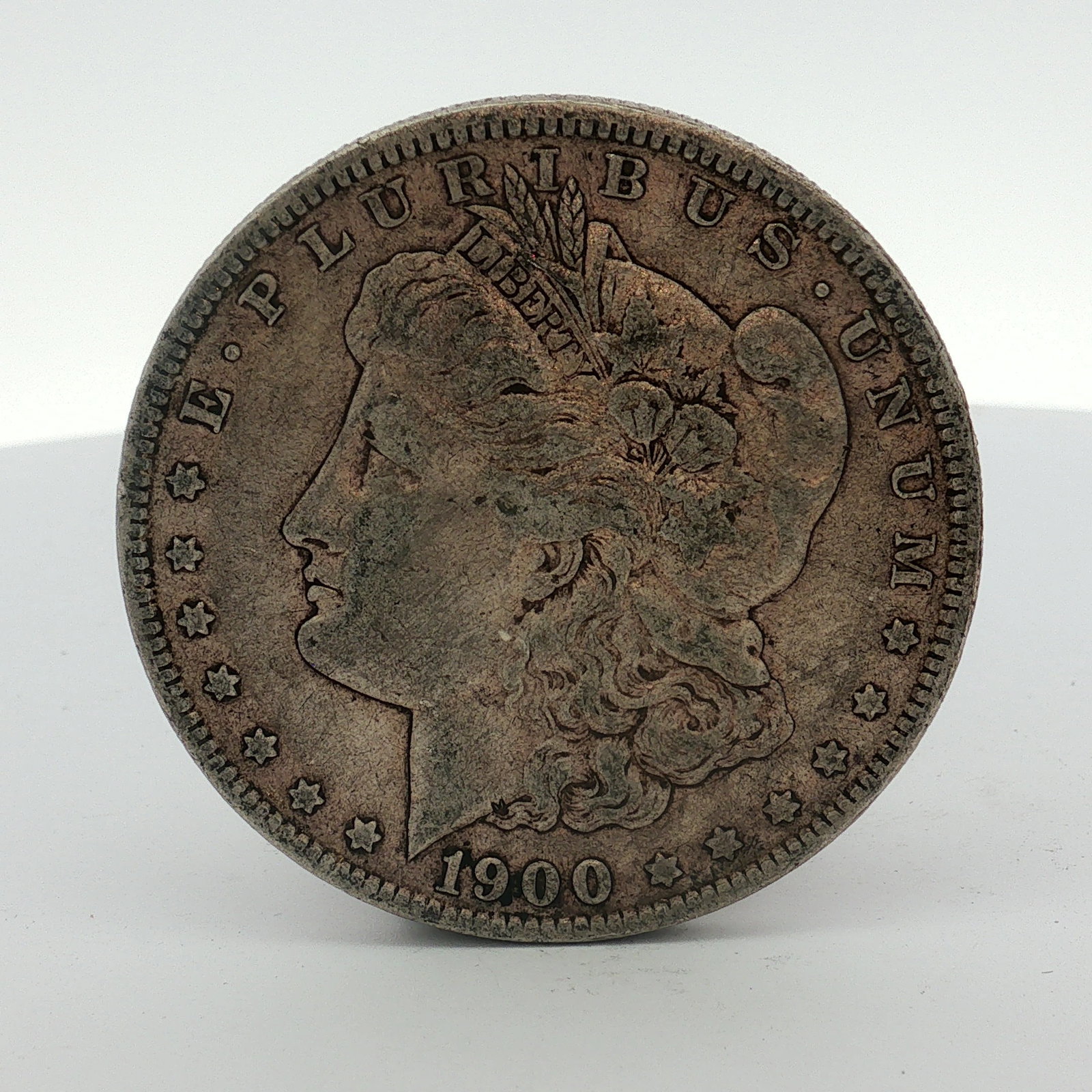 1900-O US Morgan Silver Dollar (1 of 2)
