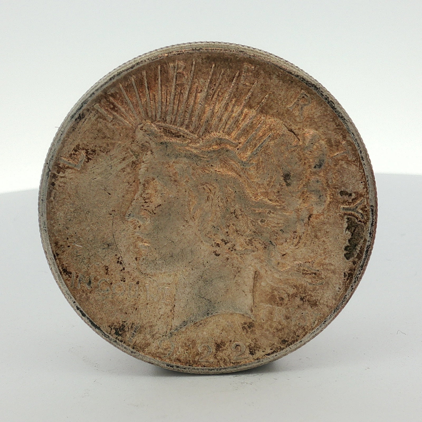 1922-D US One Dollar Peace Silver Dollar, Circulated (1 of 2)