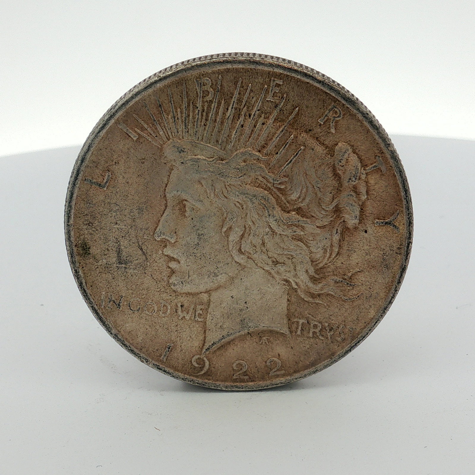 1922-D US One Dollar Peace Silver Dollar, Circulated (1 of 2)