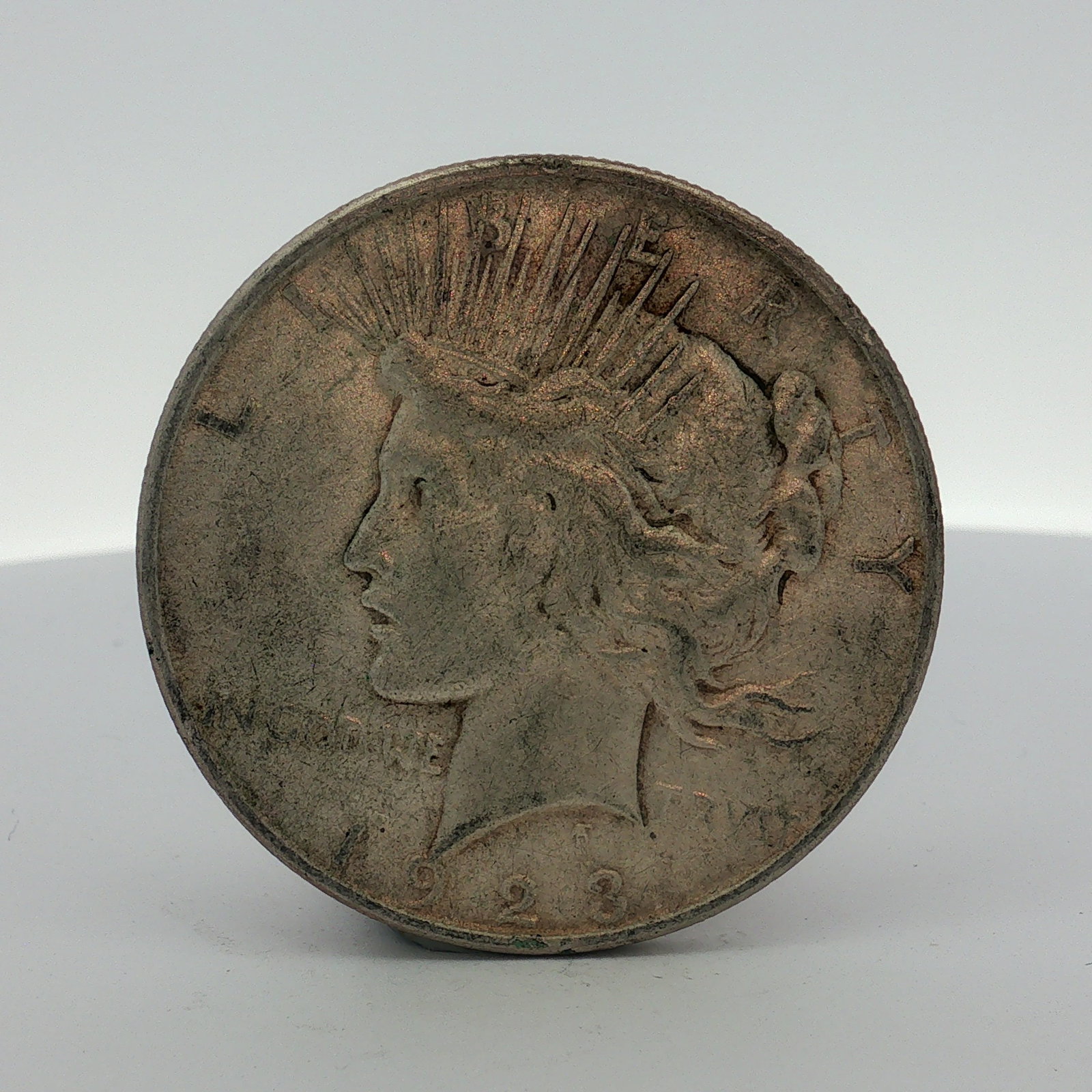 1923-D US One Dollar Peace Silver Dollar, Circulated (1 of 2)