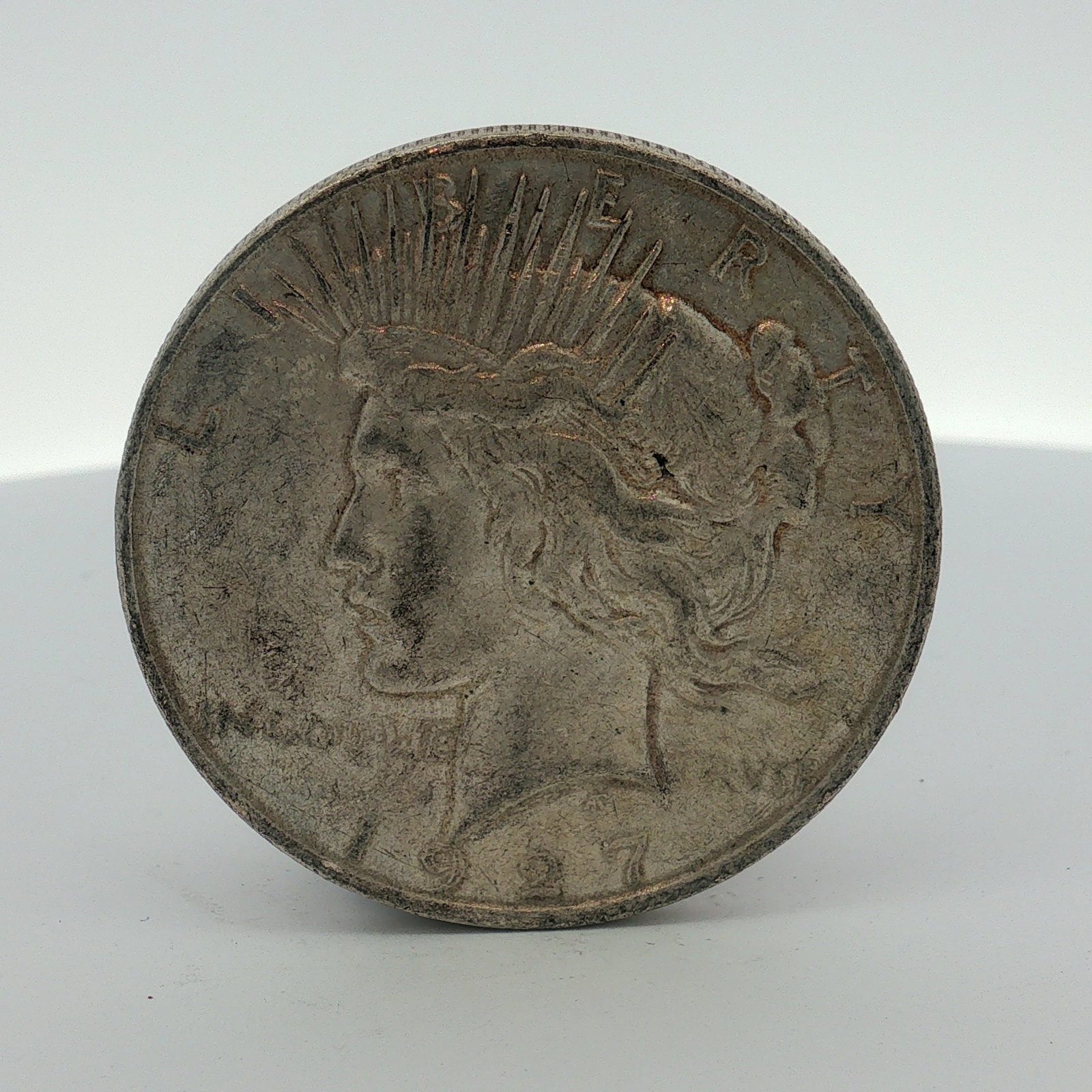 1927-D US One Dollar Peace Silver Dollar, Circulated (1 of 2)