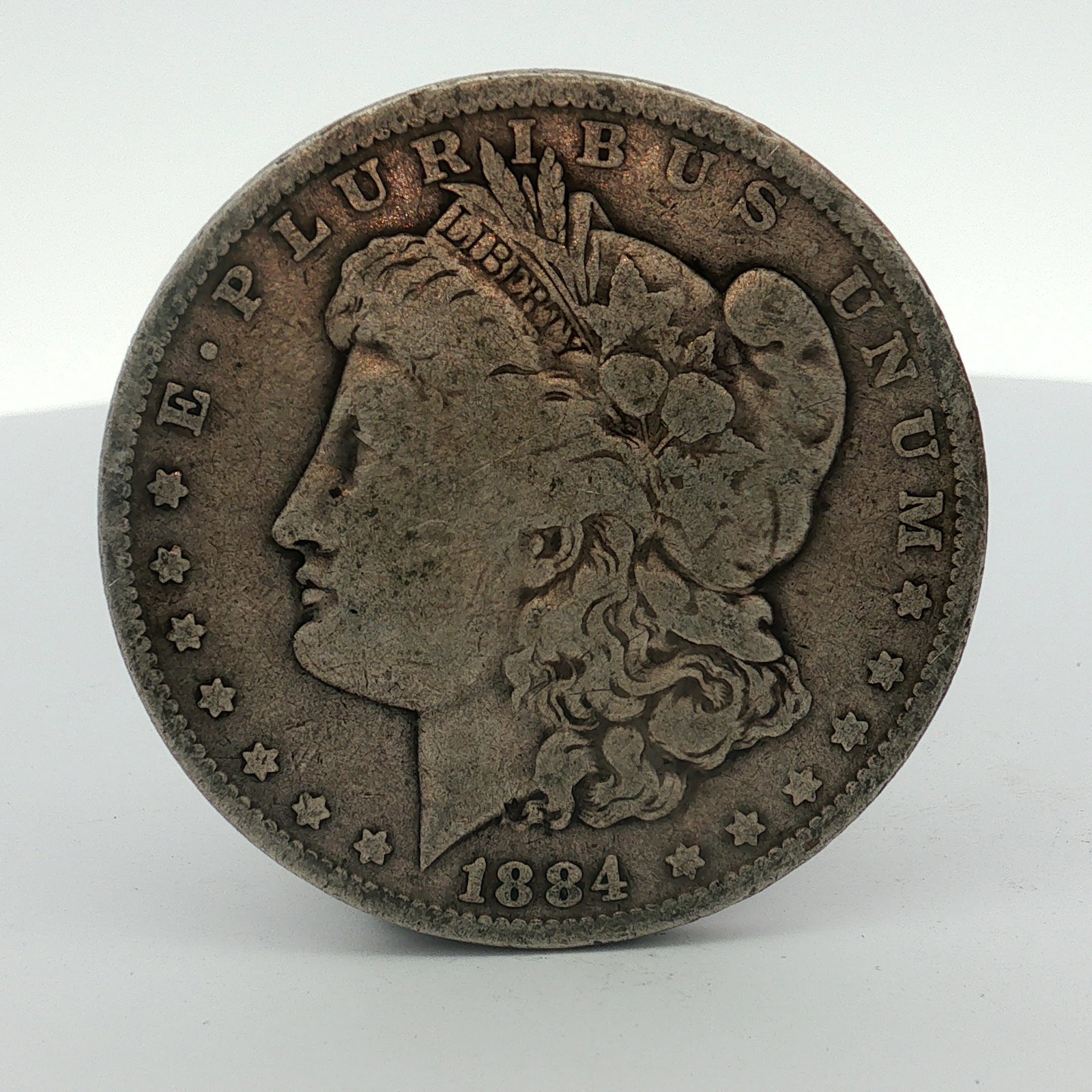 US 1884-O Morgan Silver Dollar (1 of 2)