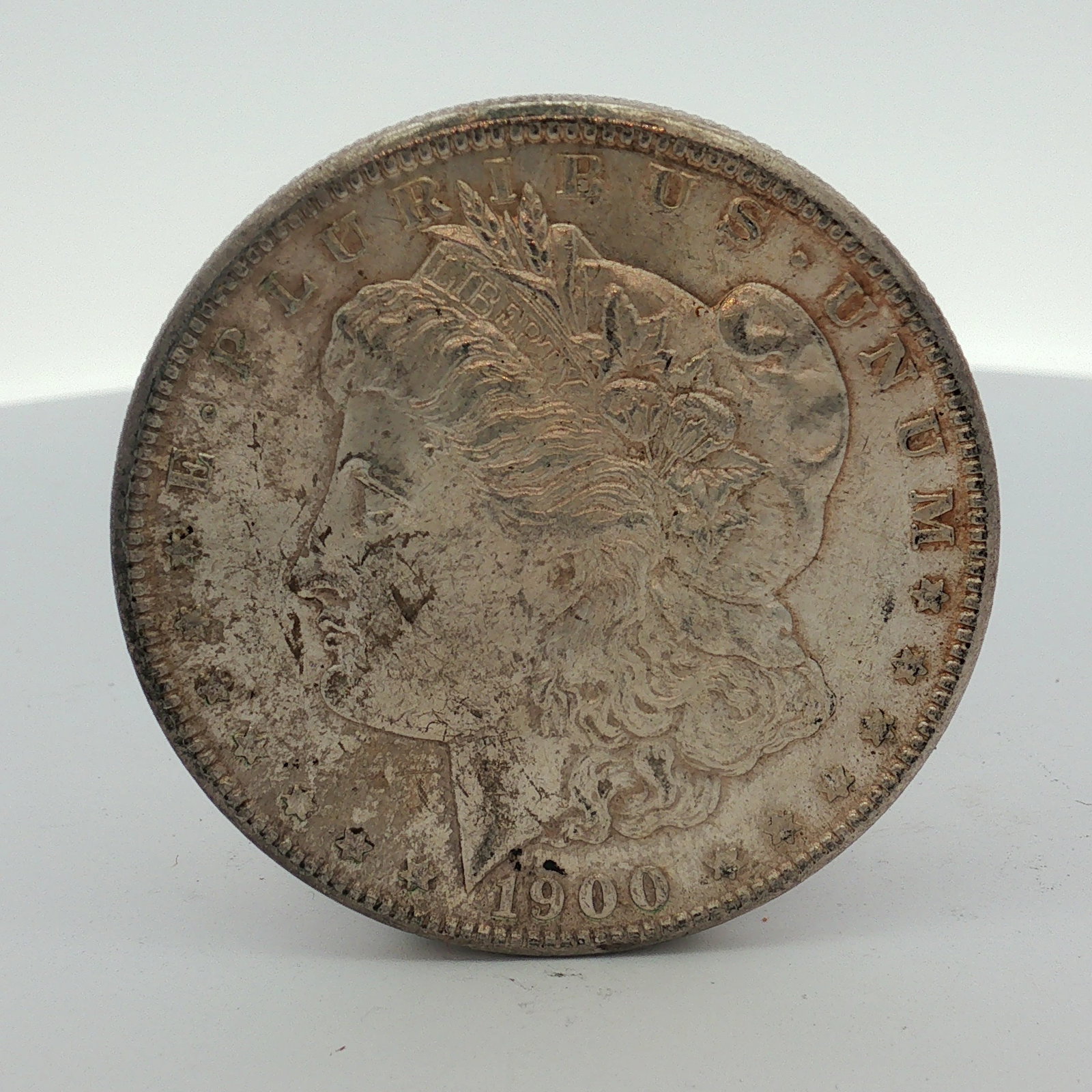 US 1900-O Morgan Silver Dollar (1 of 2)