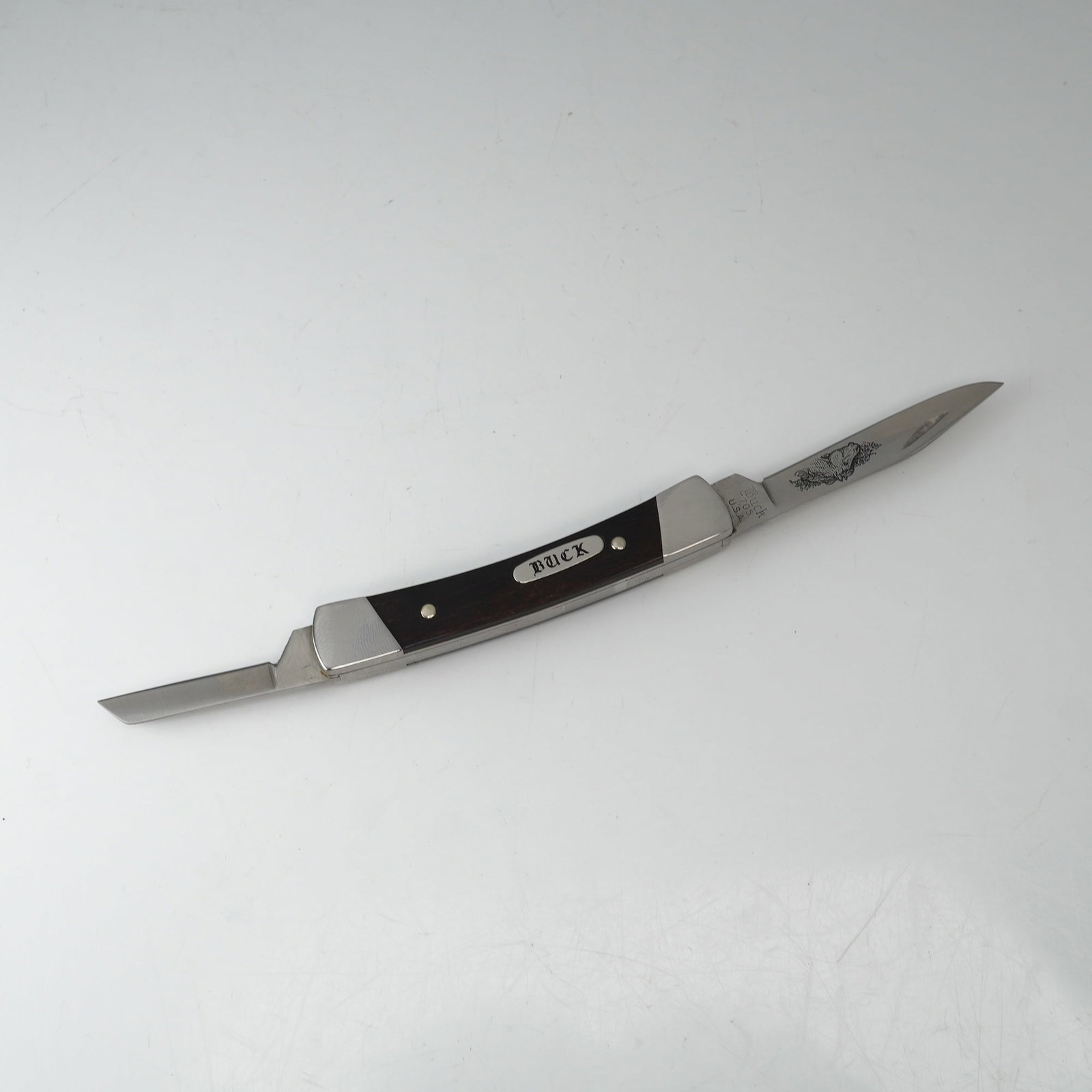 Buck Knives Buck Pony Limited Edition Folding Pocket Knife with COA: This Buck Knives Model 705 Buck Pony is a limited edition two-blade folding pocket knife manufactured in the USA. The knife features a stainless steel clip point main blade and a pen secondary blade. 