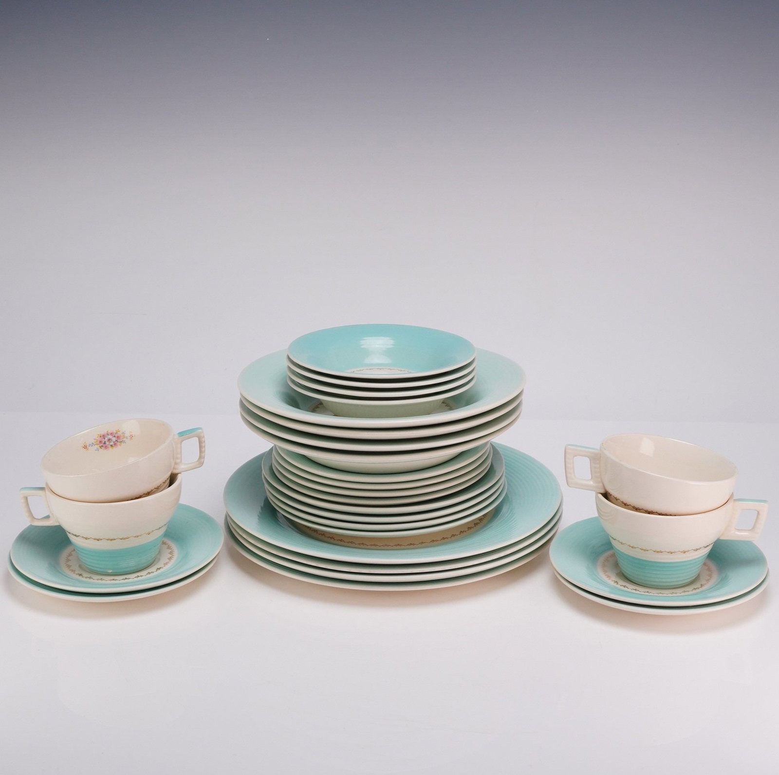 28pc Limoges China Company Mist Cotillion Blue Pattern Empress Shape Dinnerware Set for 4: This blue flowered china set for four was manufactured by the Limoges China Company of Sebring, Ohio. The items are constructed from glazed earthenware, also known as semi-porcelain, in the Empress