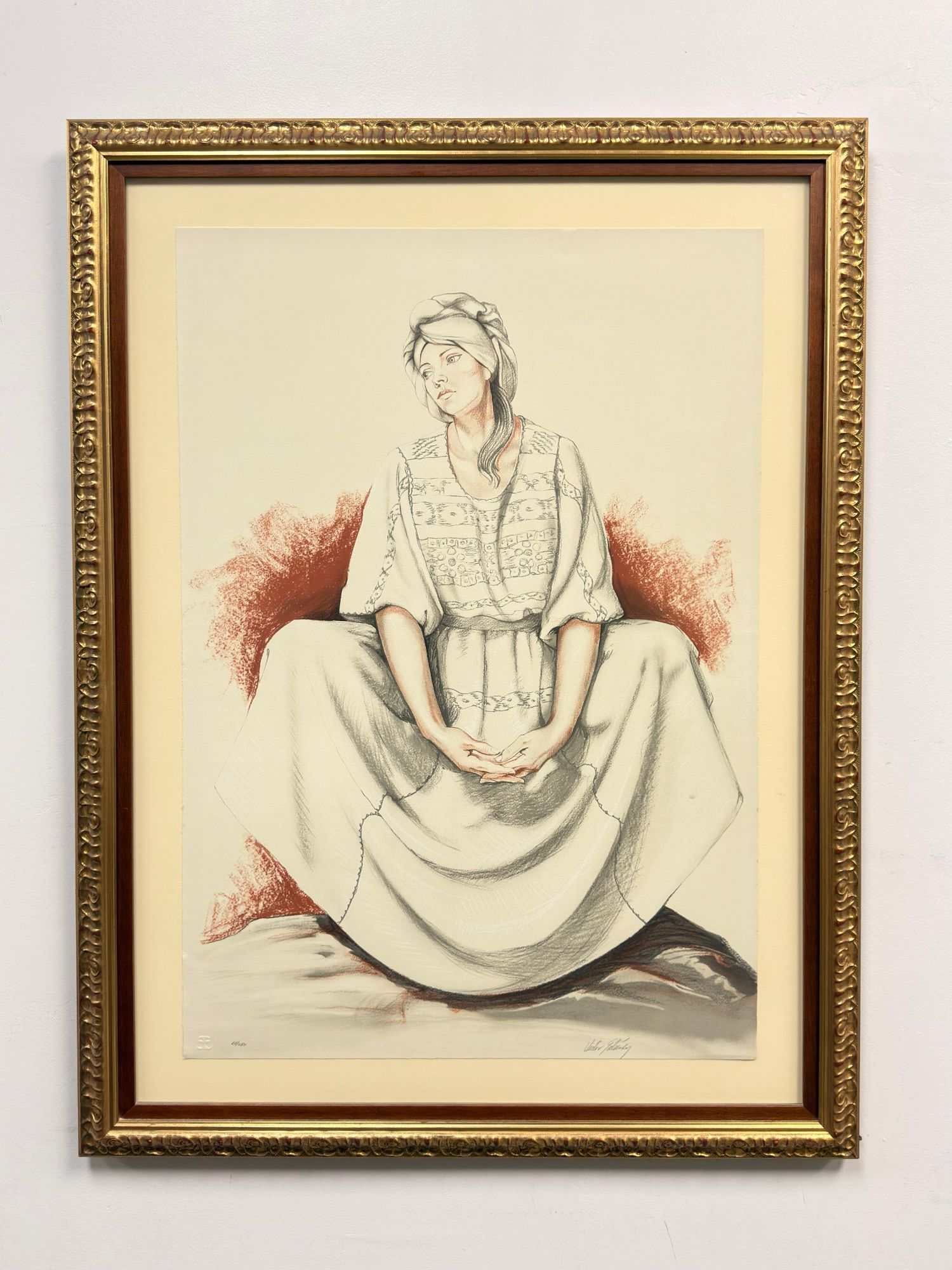Victor Gutierrez (Mexican, b. 1950), Seated Woman, Framed Serigraph: This framed serigraph is by the Mexican artist Victor Gutierrez. The artwork depicts a seated woman in traditional attire, featuring a patterned blouse and a large headwrap, with her hands clasped in 