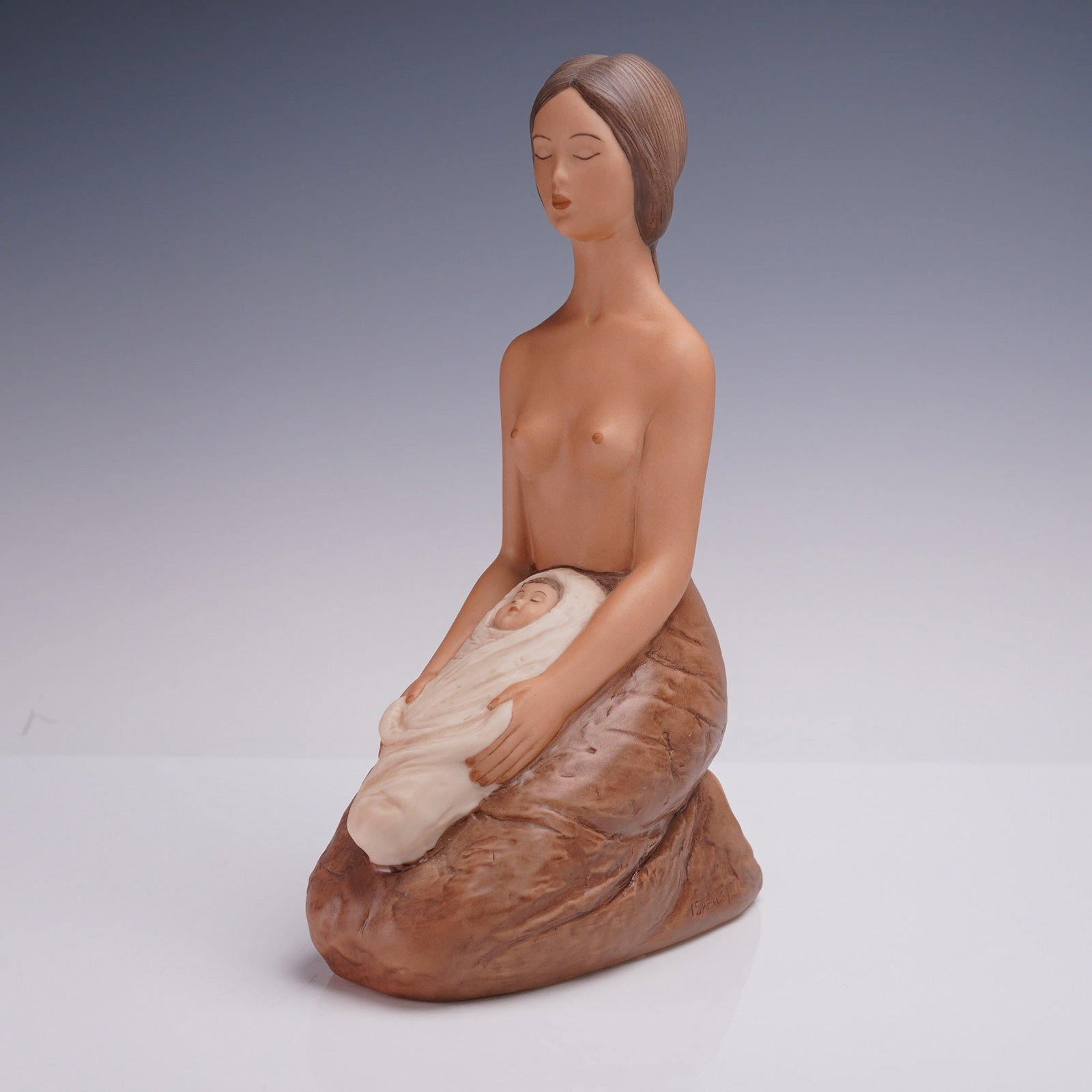 Laszlo Ipansky Porcelain Sculpture, Mother & Baby Inner Calm: The sculpture reflects a mother cradling her child with a serene expression. This work expresses Ipansky's signature approach-balancing emotional expression with sculptural simplicity. The elongated f