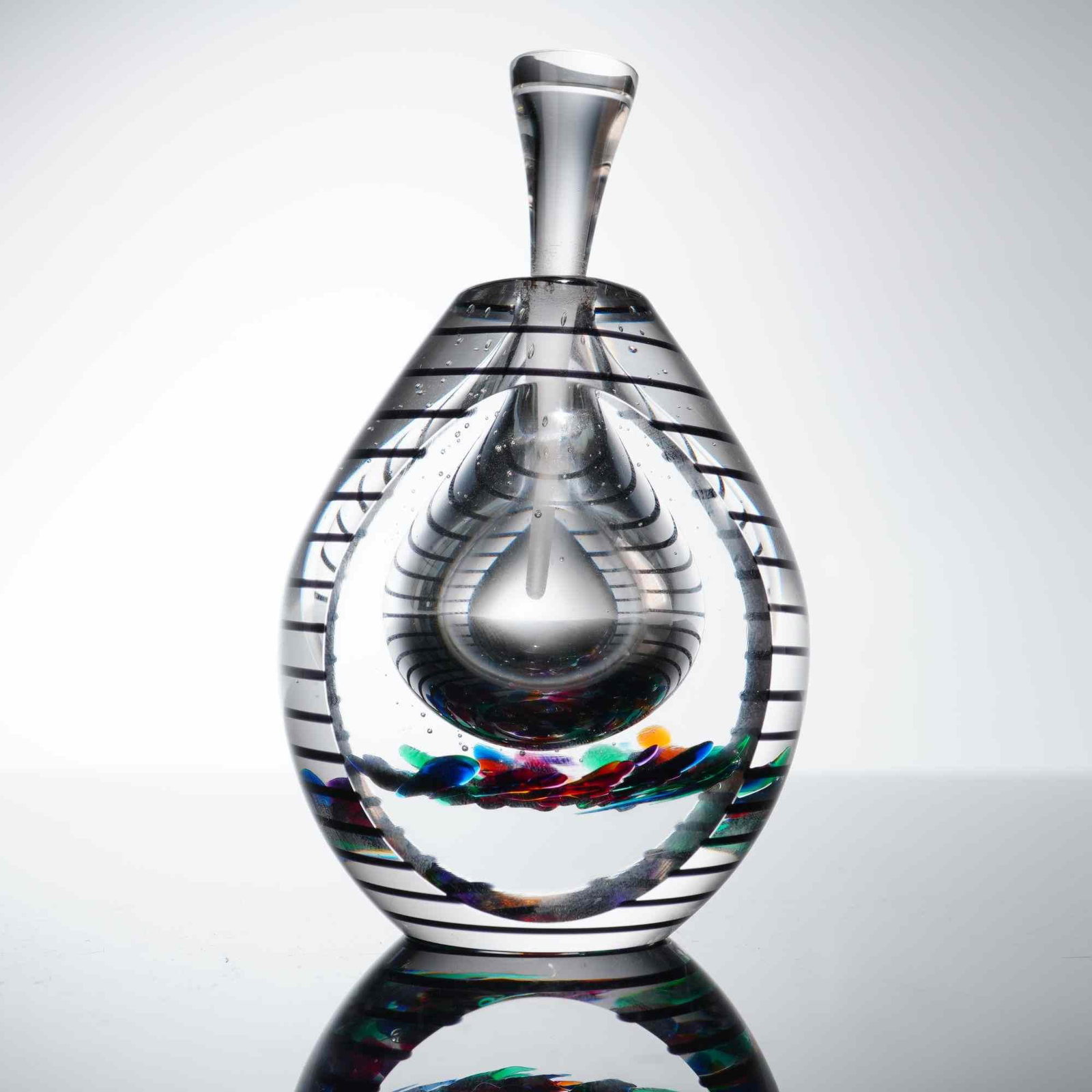 Fire Island Studio by Matthew LaBarbera Art Glass Perfume Bottle and Stopper: This hand-blown art glass perfume bottle and stopper is a production of Fire Island Glass Studio, signed by artist Matthew LaBarbera. The piece is crafted in a substantial ovoid form of thick-walled c