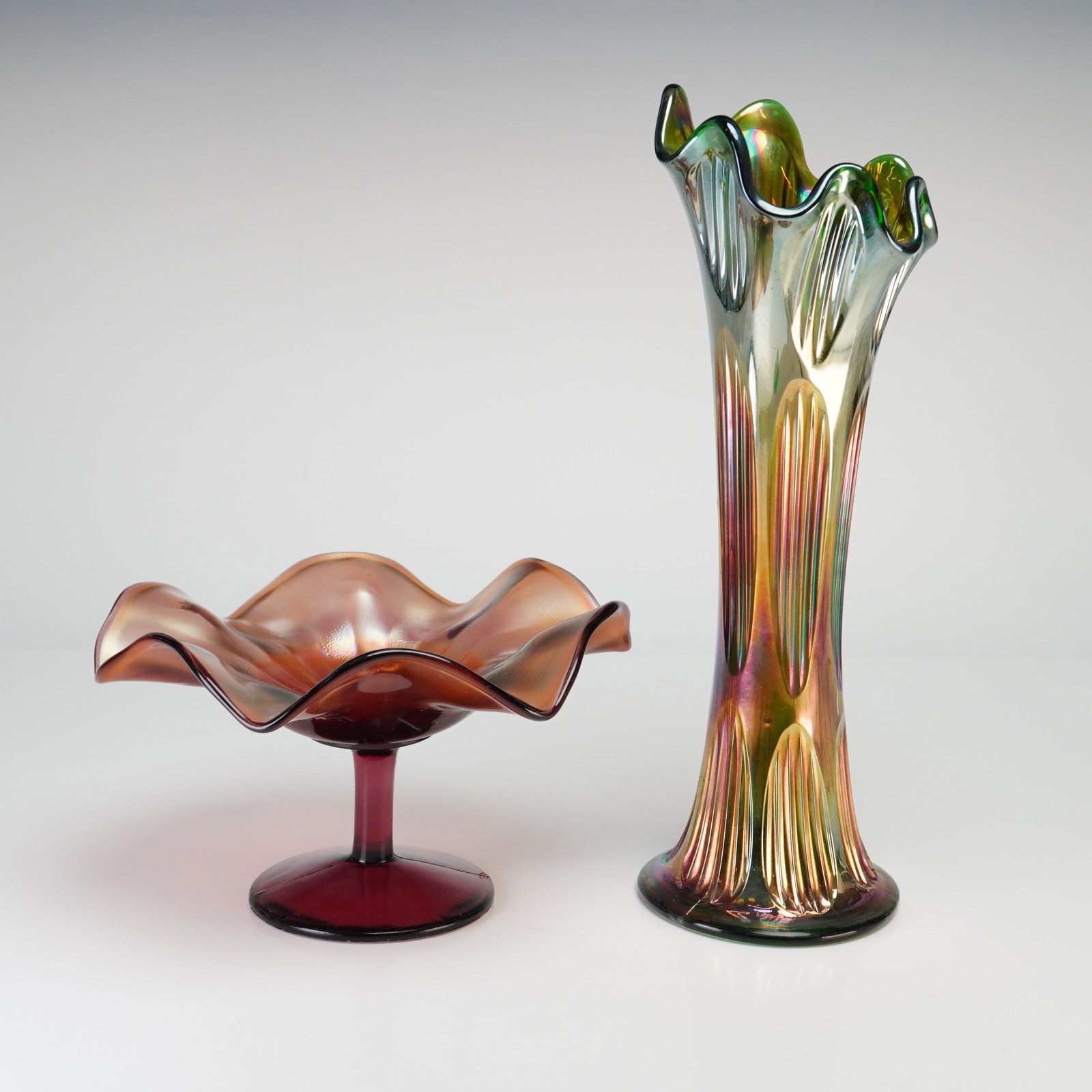 Two Pieces of American Iridescent Carnival Glass including a Swung Vase and Compote (1 of 3)