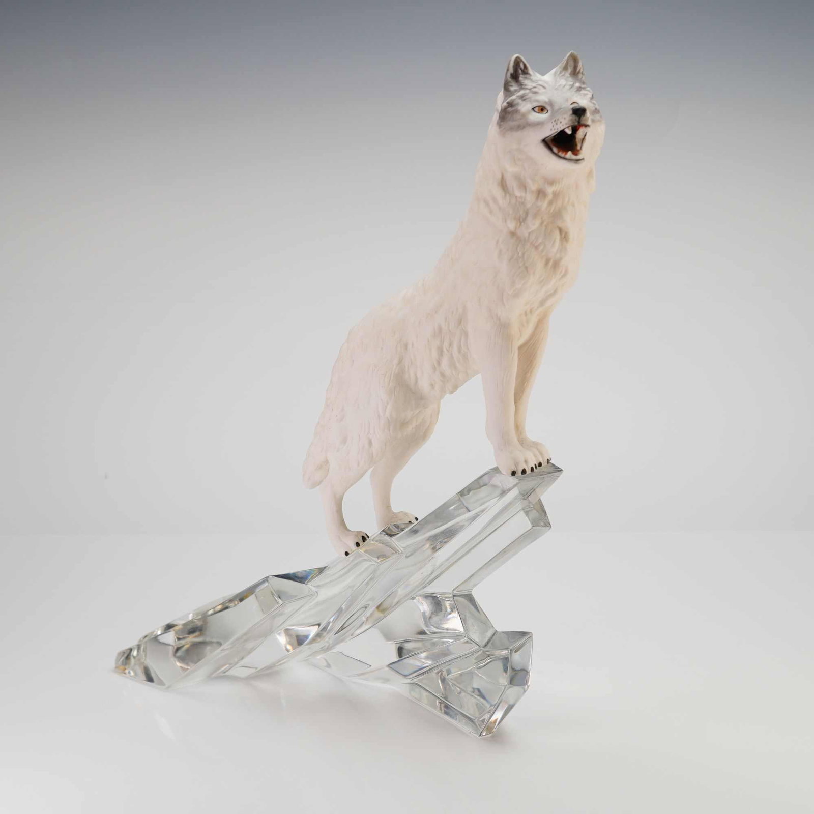 Goebel for Franklin Mint Call of the Wild Wolf Figurine: This fine Goebel bisque porcelain wolf ceramic figurine on glass rock is part of the Call of the Wild collection produced for Franklin Mint. The piece features a realistically rendered white wolf in a
