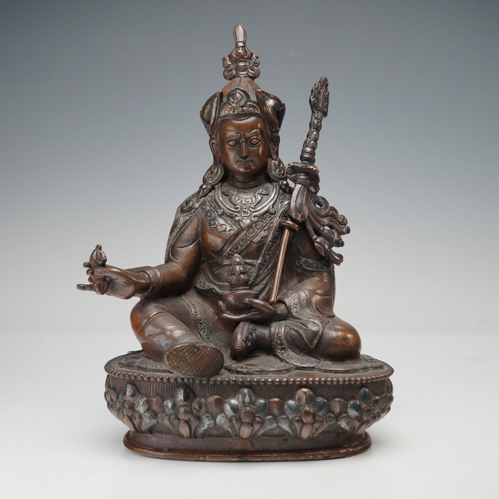 Tibetan Bronze Seated Deity with Silver Overlay (1 of 7)