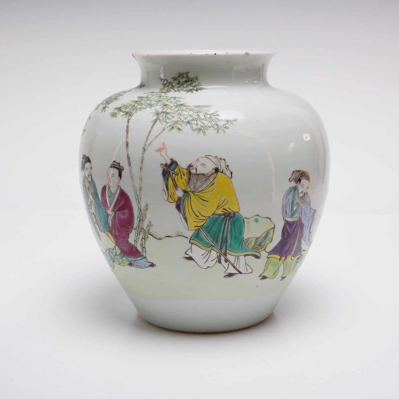 Famille Rose Porcelain Vase, Seven Sages and Bamboo: A famille rose porcelain vase with a bulbous body and short flared neck, hand-decorated with the Seven Sages alongside bamboo. Dimensions 7.5"W x 8"H Weight 4.0 lbs