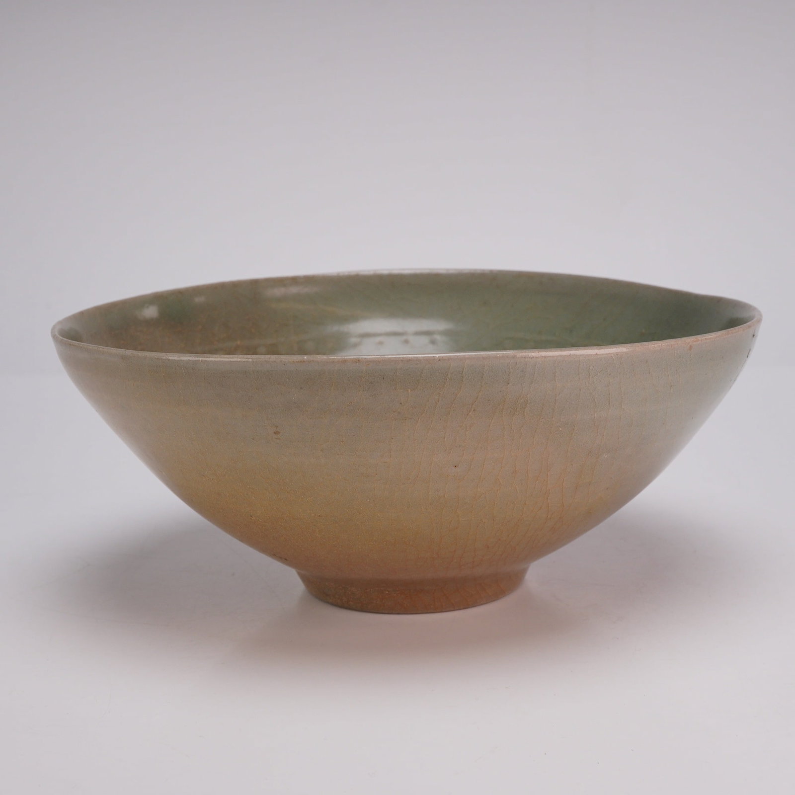 Korean Celadon Glazed Porcelain Bowl, Small Medallions and Border, Goryeo Period: This Korean celadon glazed porcelain bowl is finished in a pale green color, featuring faint medallions and a border on the interior. Dimensions 7.5"W x 3"H Weight 15.0 oz