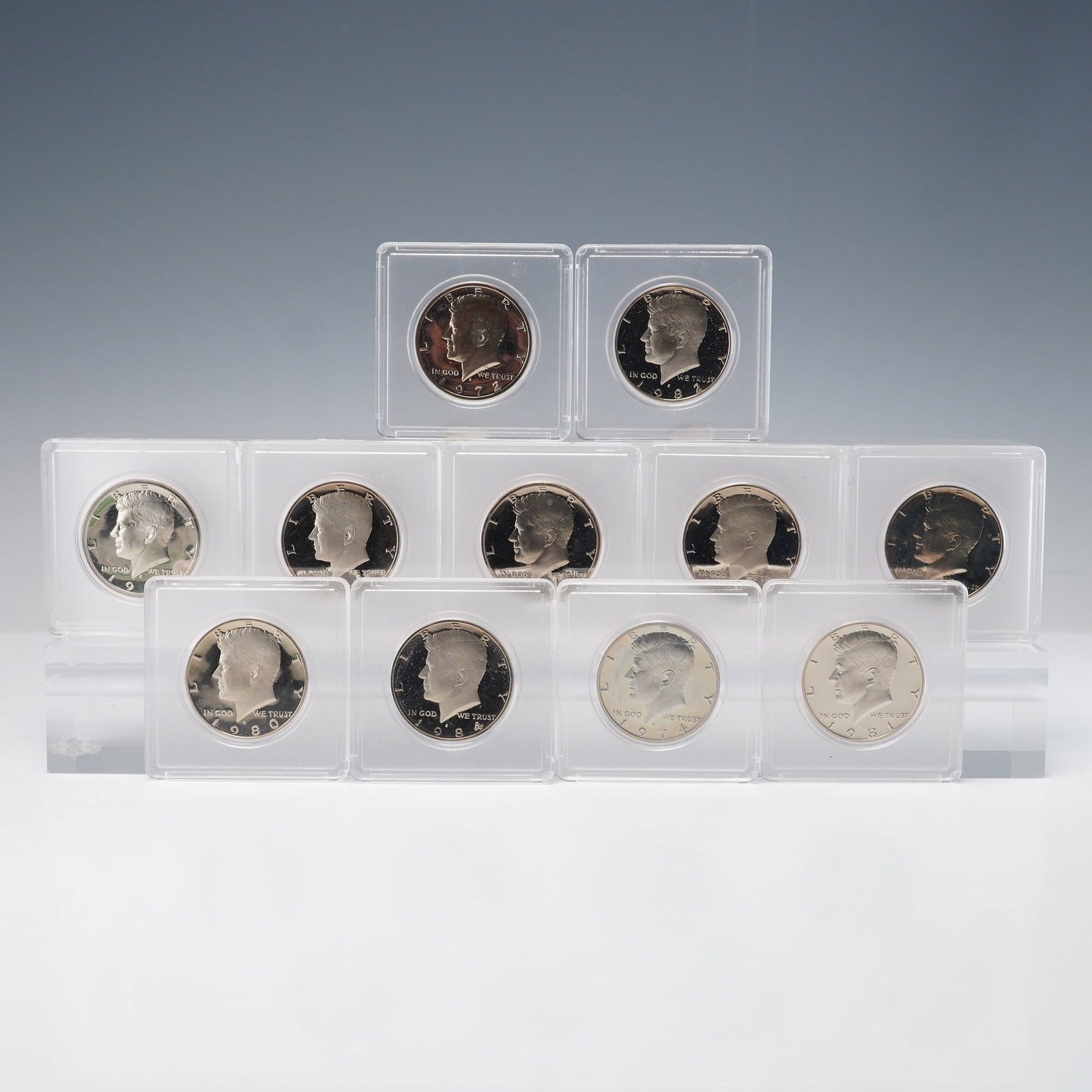 11pc 1971-S to 1974-S, 1976-S, 1980-S to 1985-S Kennedy Half Dollars: A collection of eleven proof Kennedy Half Dollars struck at the San Francisco Mint, representing issues from 1971 through 1974, 1976, and 1980 through 1985. Designed by Gilroy Roberts and Frank Gaspar