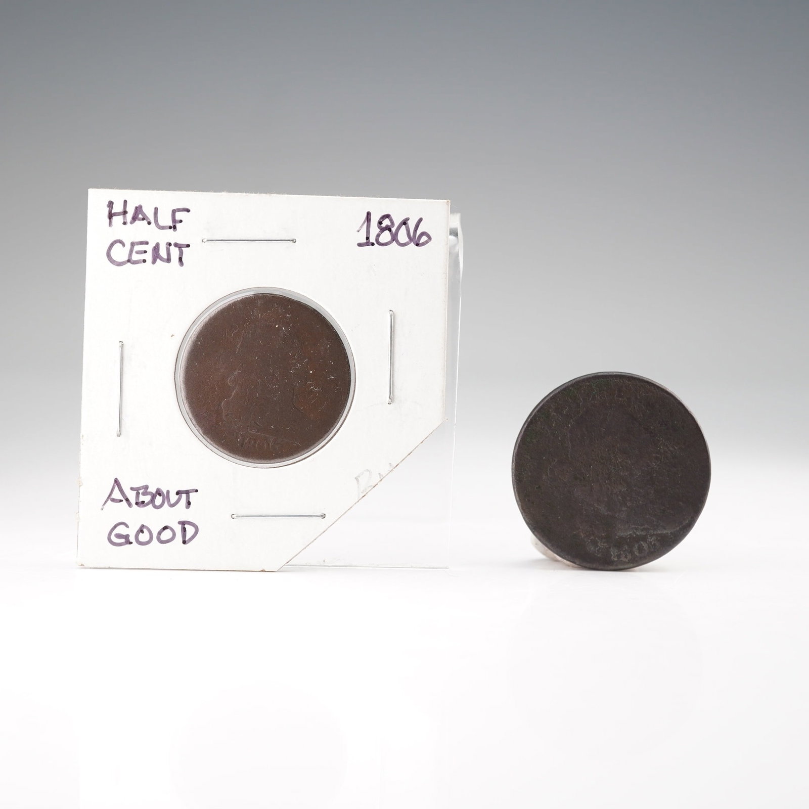 2pc 1803-(P) to 1806-(P) Draped Bust 1 & Half Cent Coins: The lot features two early U.S. copper coins struck at the Philadelphia Mint. The first is an 1803 Draped Bust Large Cent, composed of copper and bearing the classic Liberty portrait on the obverse wi